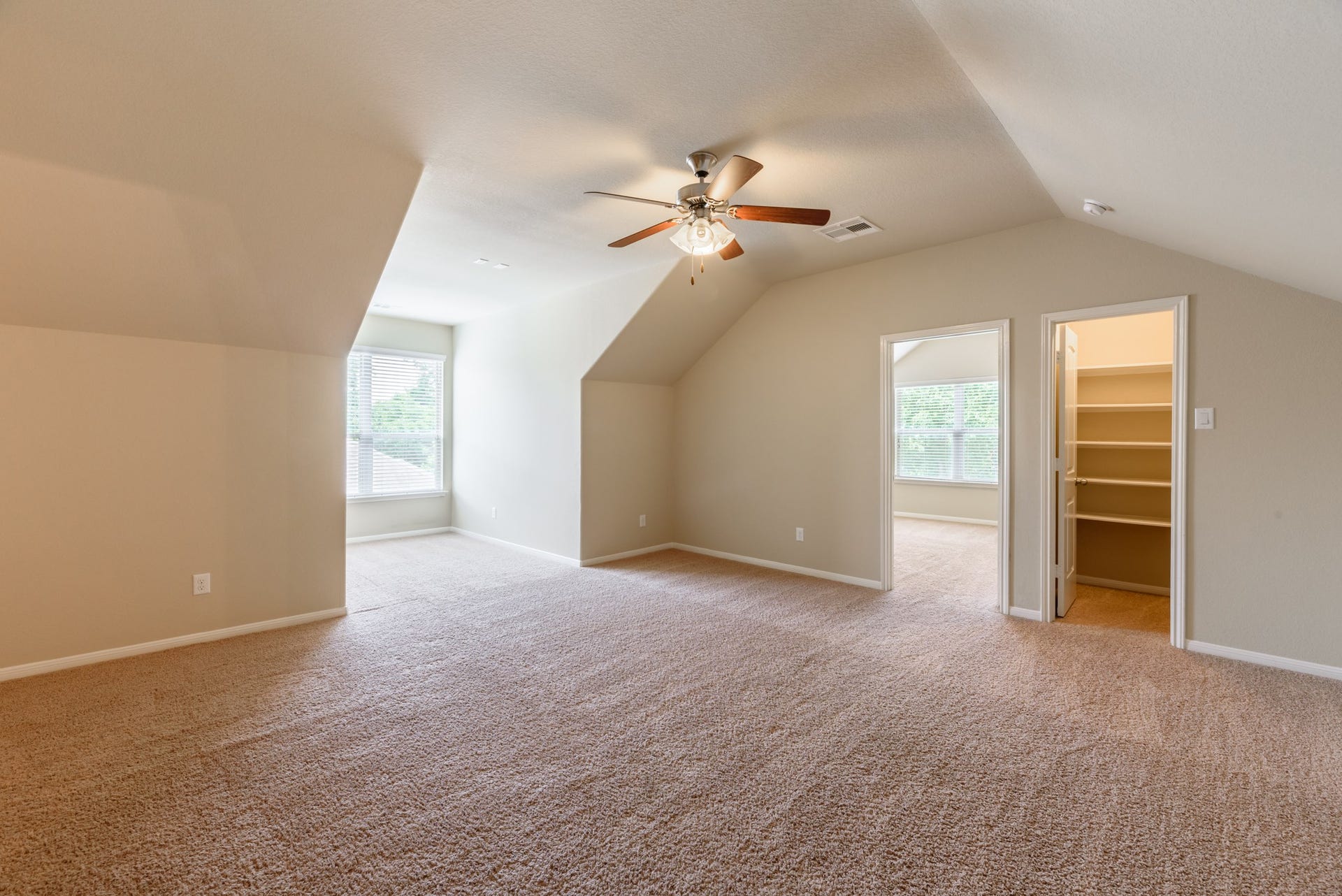 202 Black Swan Place, Magnolia, TX 77354 View from the game room looking into a secondary bedroom and storage closet.