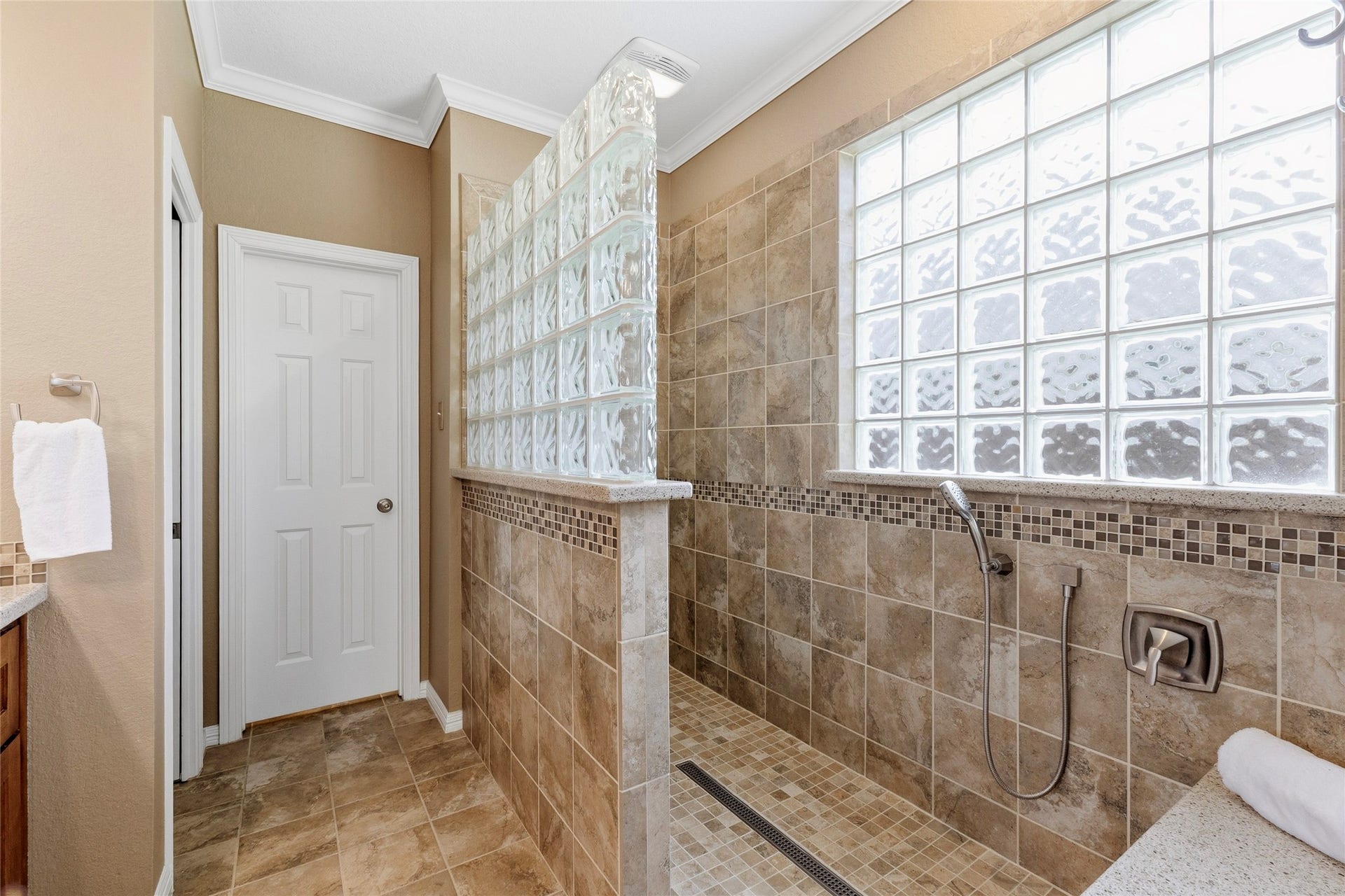 15314 Ledgewood Park Drive, Cypress, TX 77429 Shower is a must see with the custom tilework, Kohler fixtures, and shower bench.
