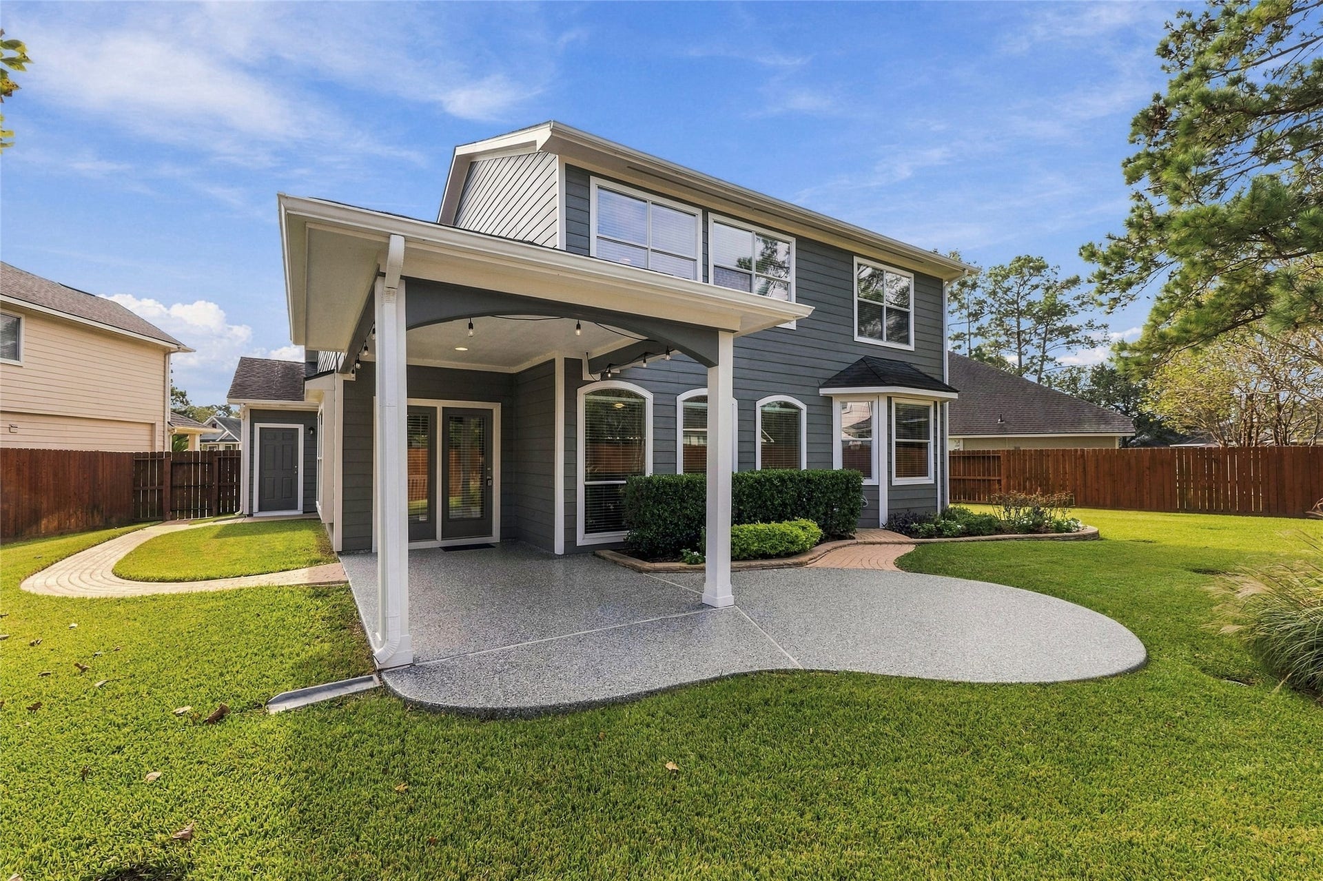 15314 Ledgewood Park Drive, Cypress, TX 77429 Enjoy a spacious covered patio with an extension and Epoxy coating.