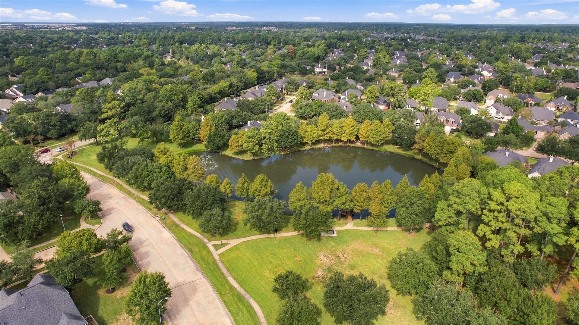 15314 Ledgewood Park Drive, Cypress, TX 77429 Home is close to one of several stocked fishing ponds in the community.