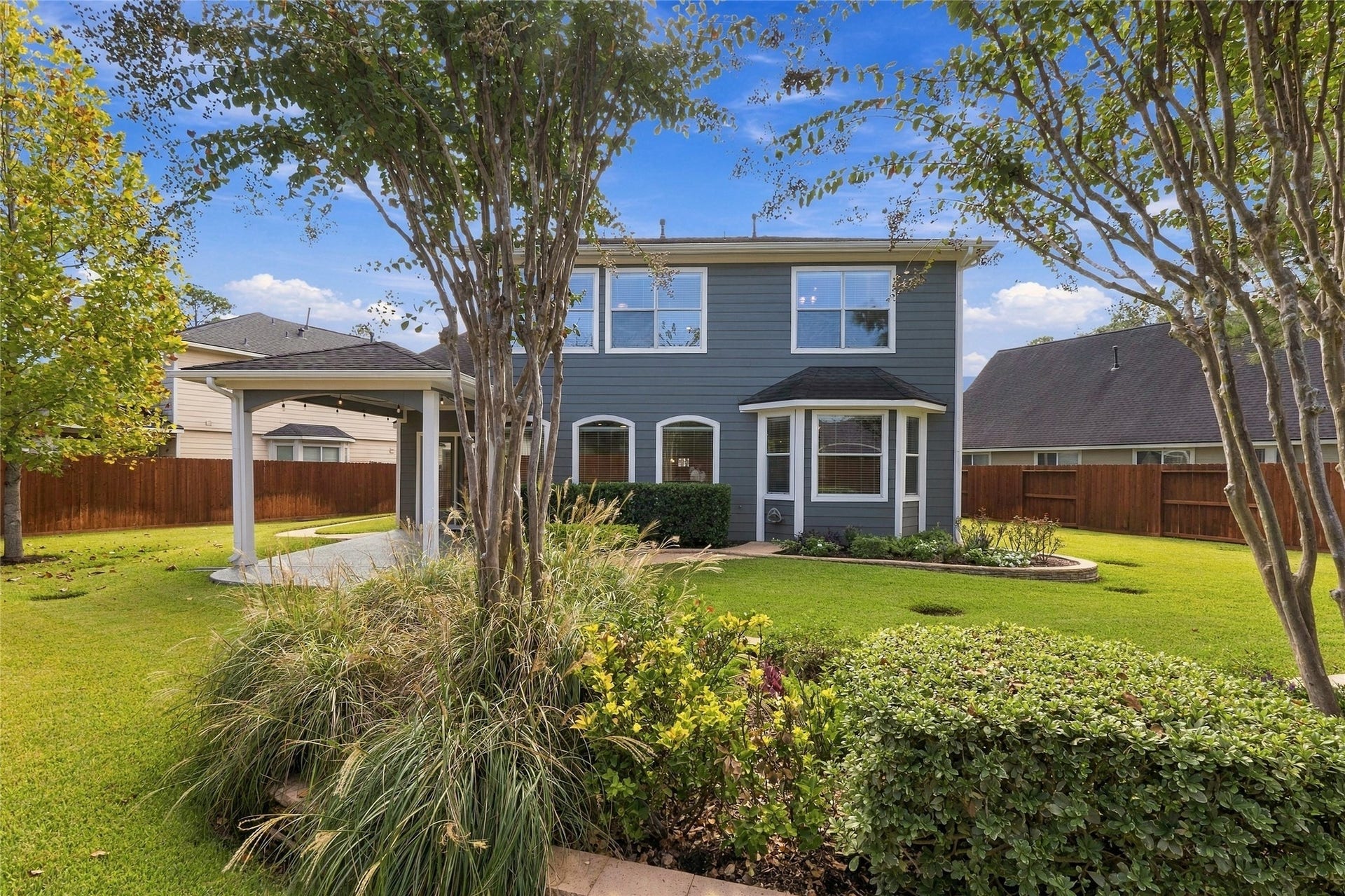 15314 Ledgewood Park Drive, Cypress, TX 77429 Custom landscaping for both front and back yards.