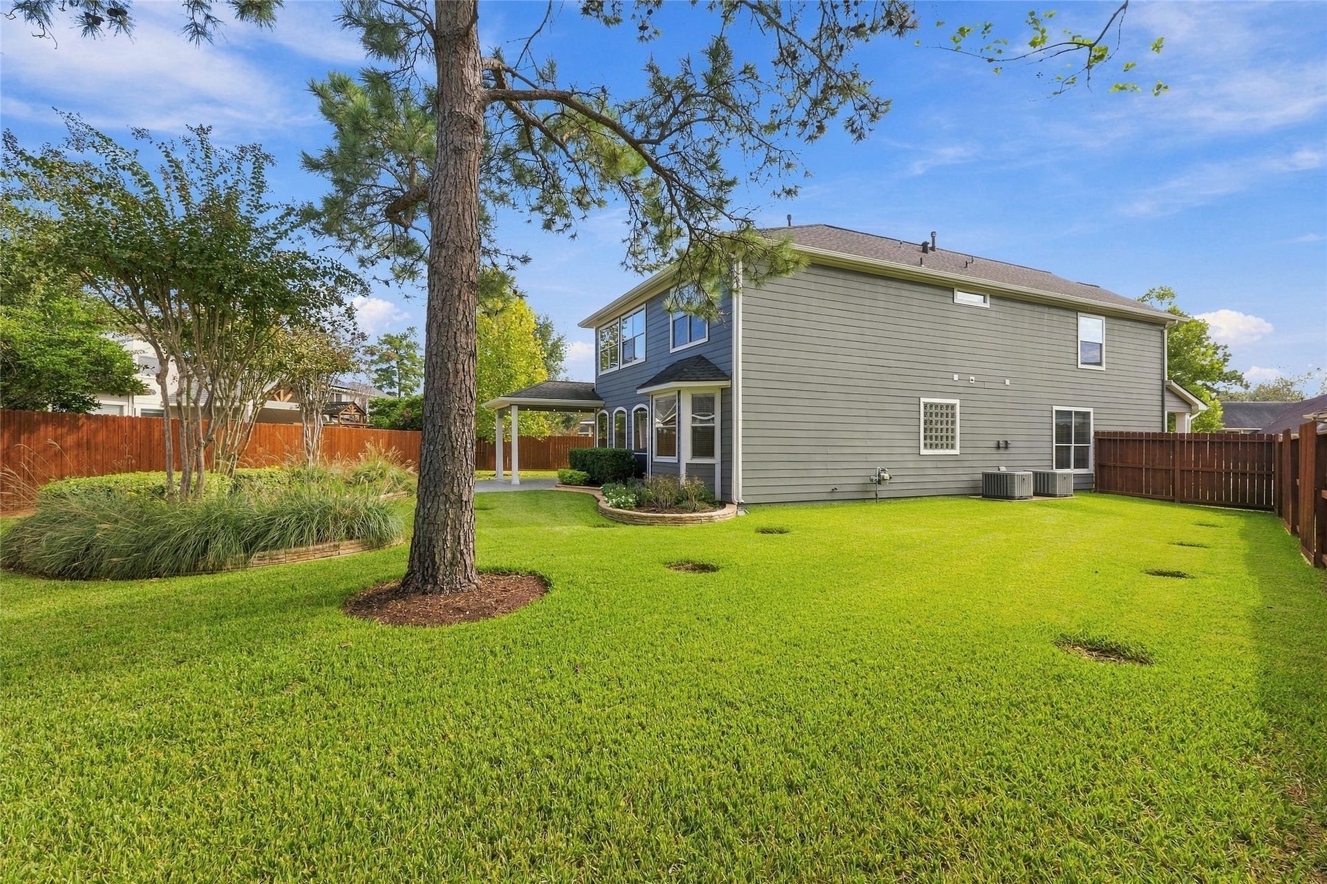 15314 Ledgewood Park Drive, Cypress, TX 77429 Huge backyard for your enjoyment and complete with a stained perimeter fence and French Drains.