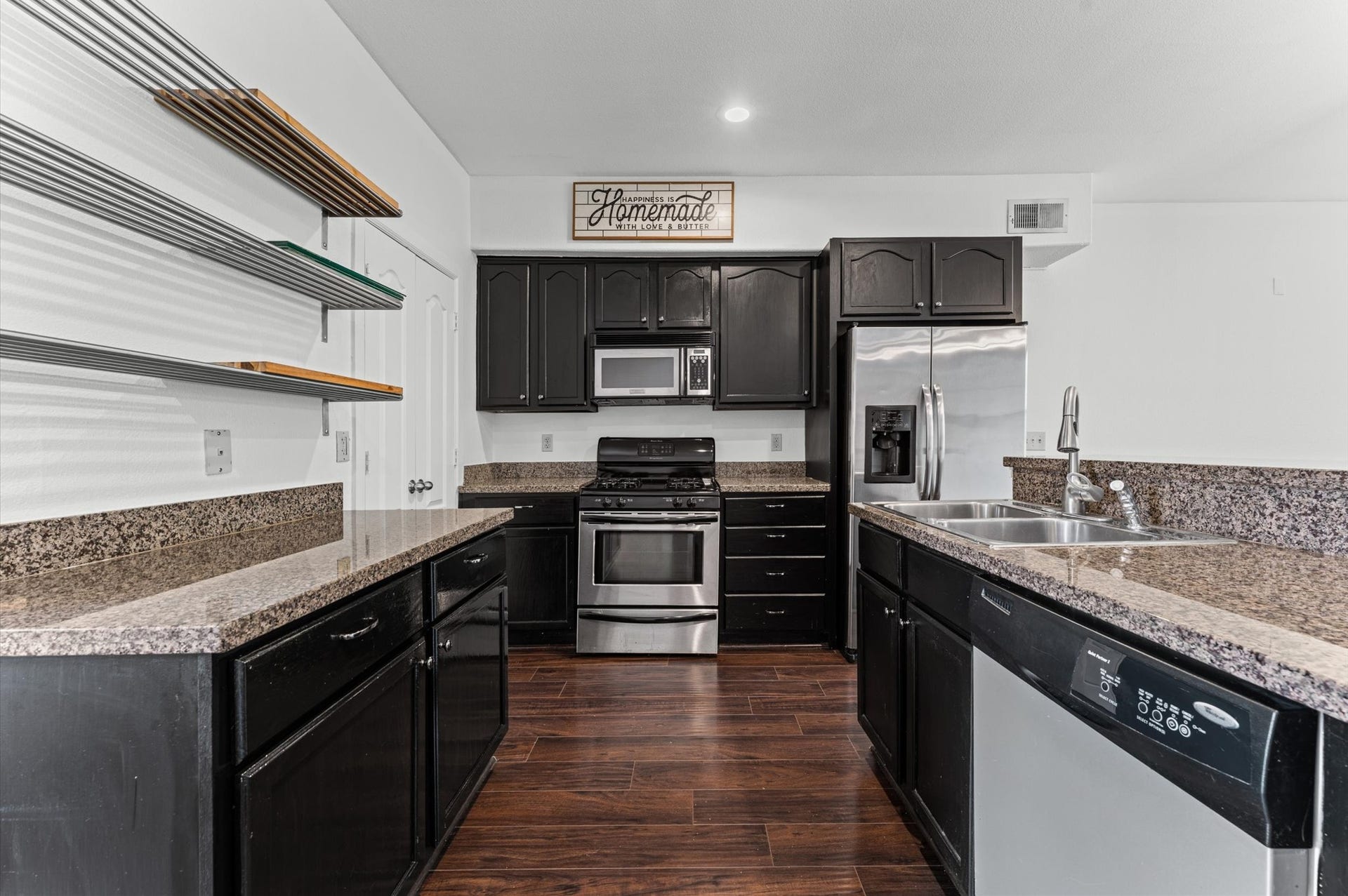 1602 Elgin Street, #10, Houston, TX 77004 The kitchen and living areas connect seamlessly, creating a comfortable, open feel throughout the unit's first floor.
