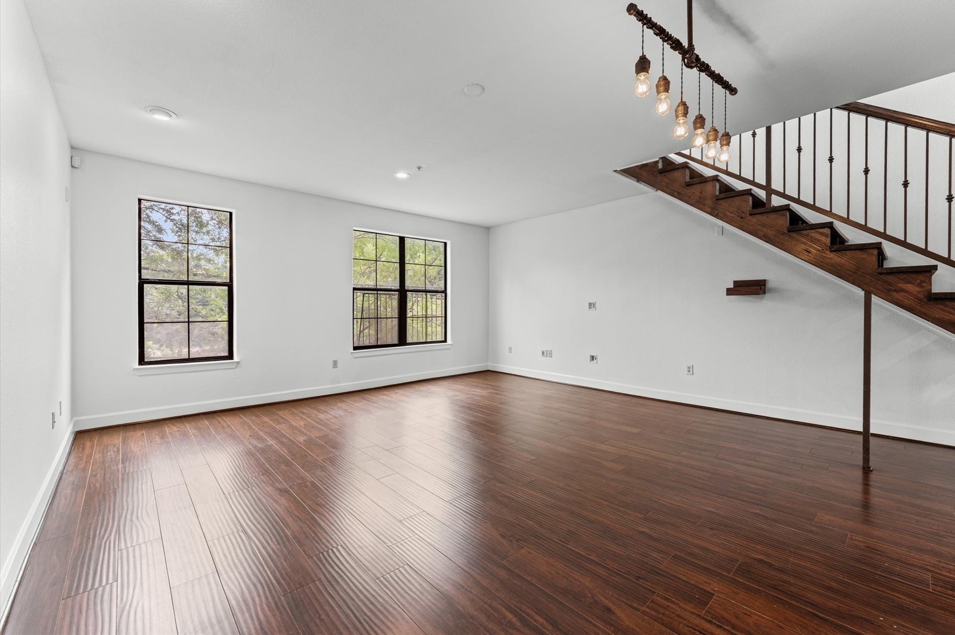 1602 Elgin Street, #10, Houston, TX 77004 The kitchen and living areas connect seamlessly, creating a comfortable, open feel throughout the unit's first floor.