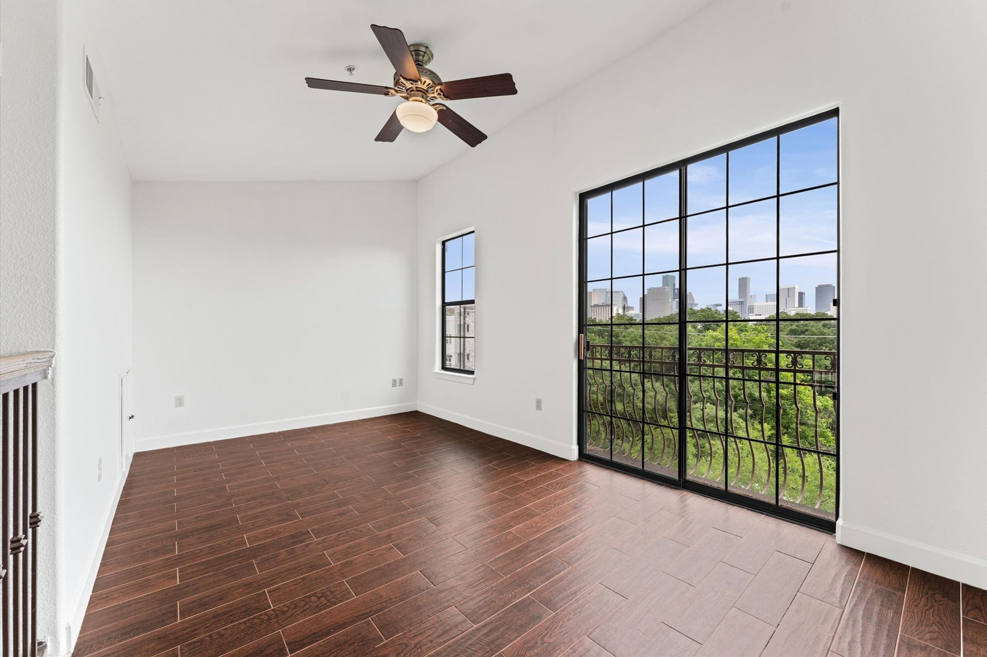 1602 Elgin Street, #10, Houston, TX 77004 Bedroom 2 is a loft on the 3rd level of the unit offering views of Downtown.