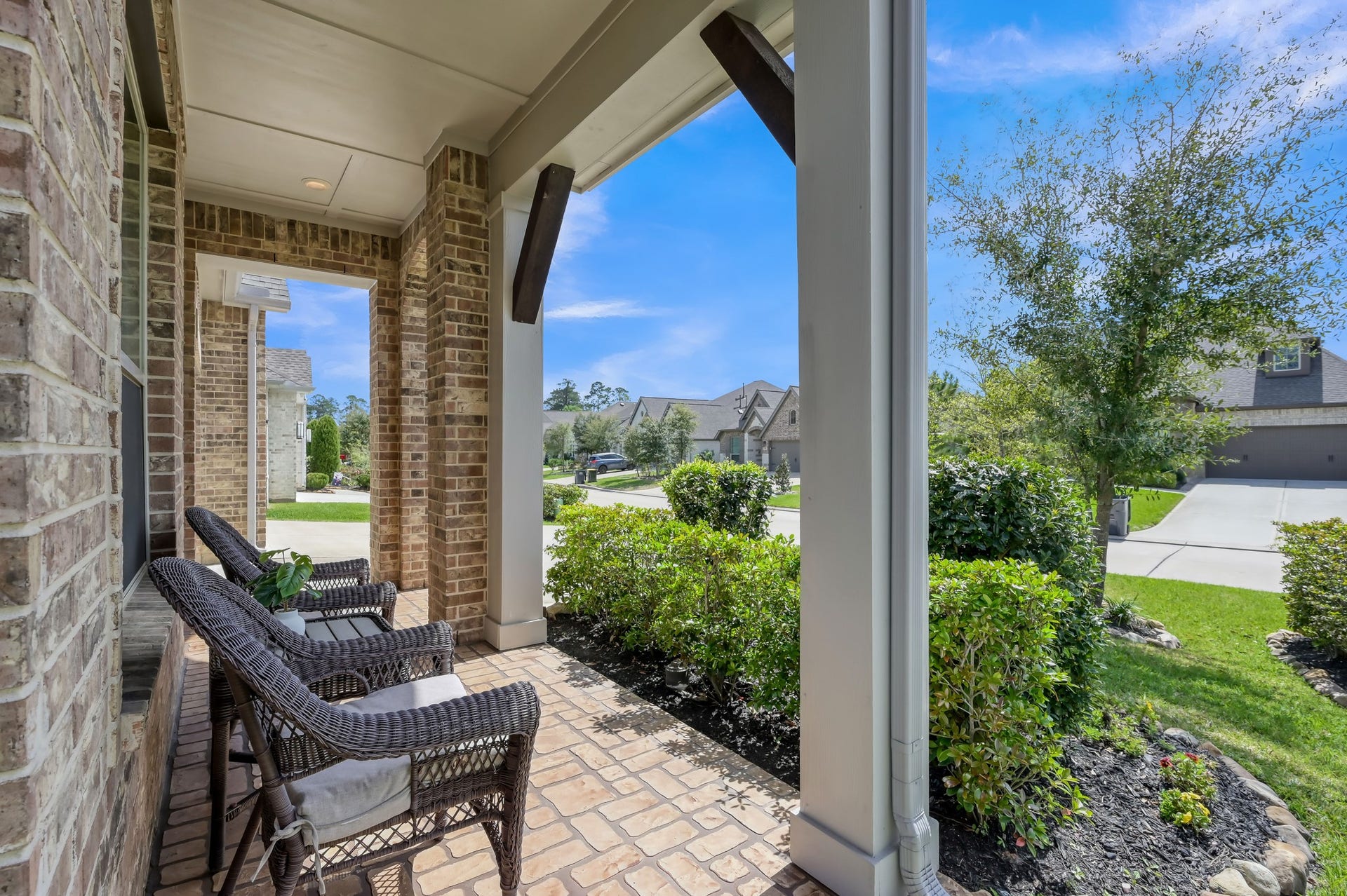 Charming covered front porchperfect for relaxing.