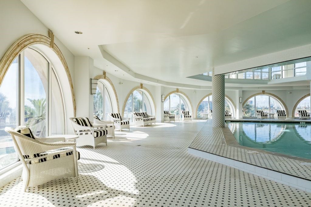 10327 Termini San Luis Pass Road, #218, Galveston, TX 77554 Diamond Beach seating area around indoor pool