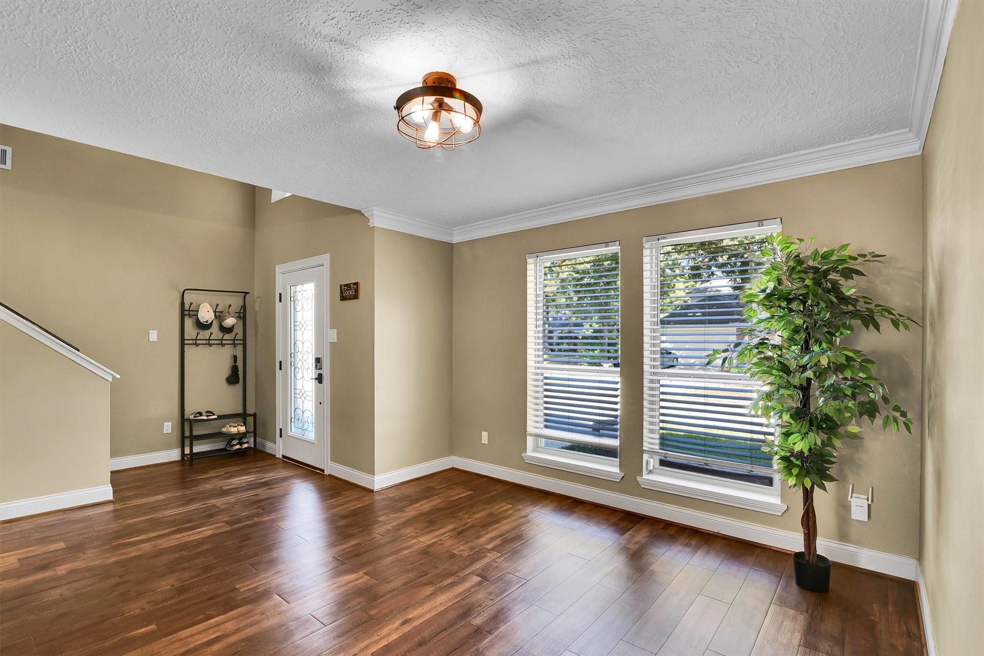 18703 Timbers Trace Drive, Humble, TX 77346 Dining room area with beautiful updated flooring.