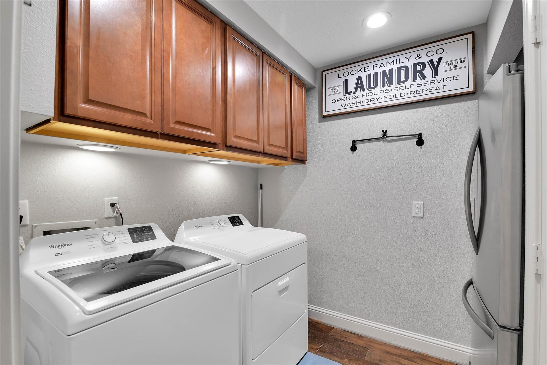18703 Timbers Trace Drive, Humble, TX 77346 Laundry room with second fridge and storage closet. See 3-D tour for all the storage.