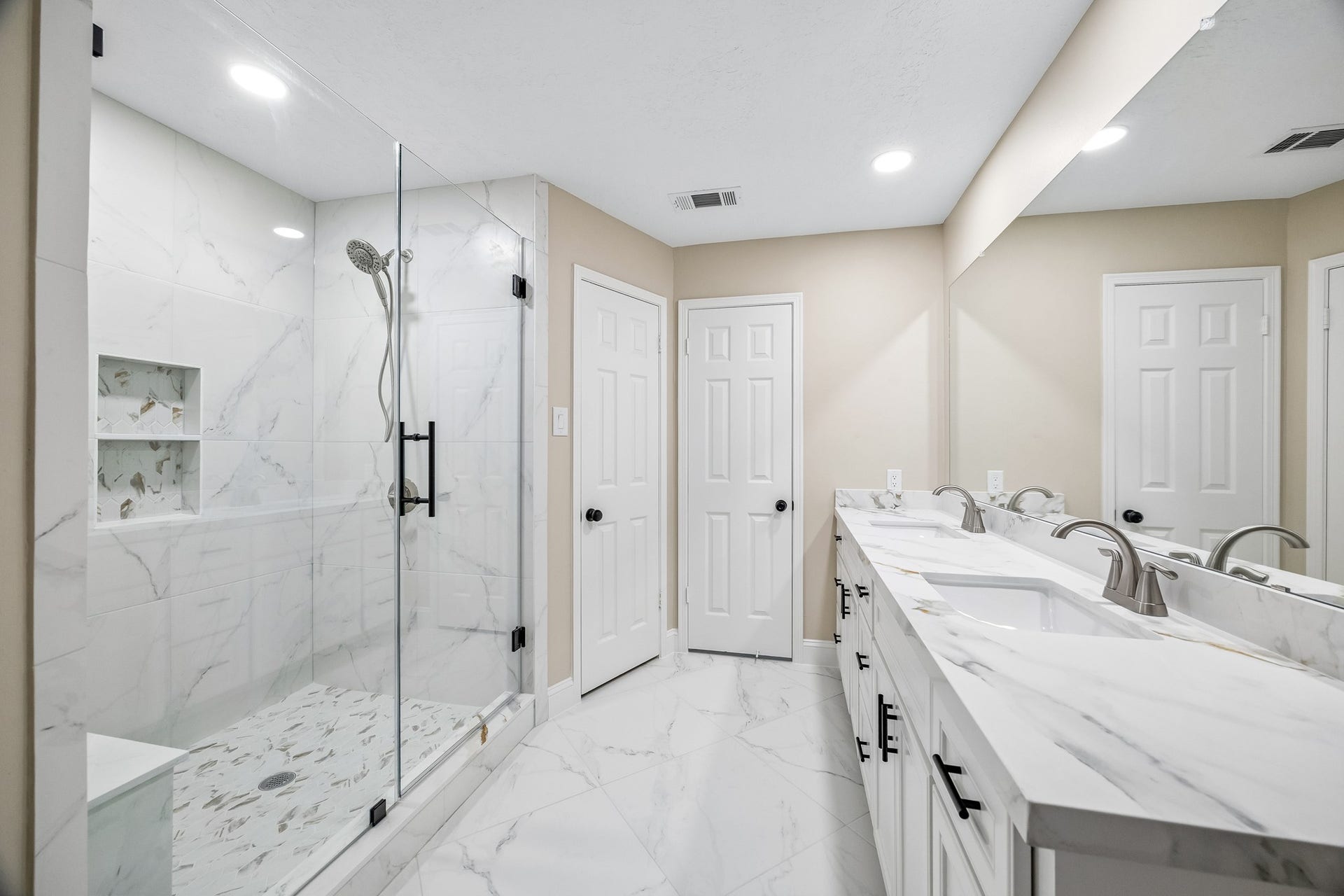 3427 Tree Lane, Kingwood, TX 77339 Completely remodeled bath. Look at the quartz countertops