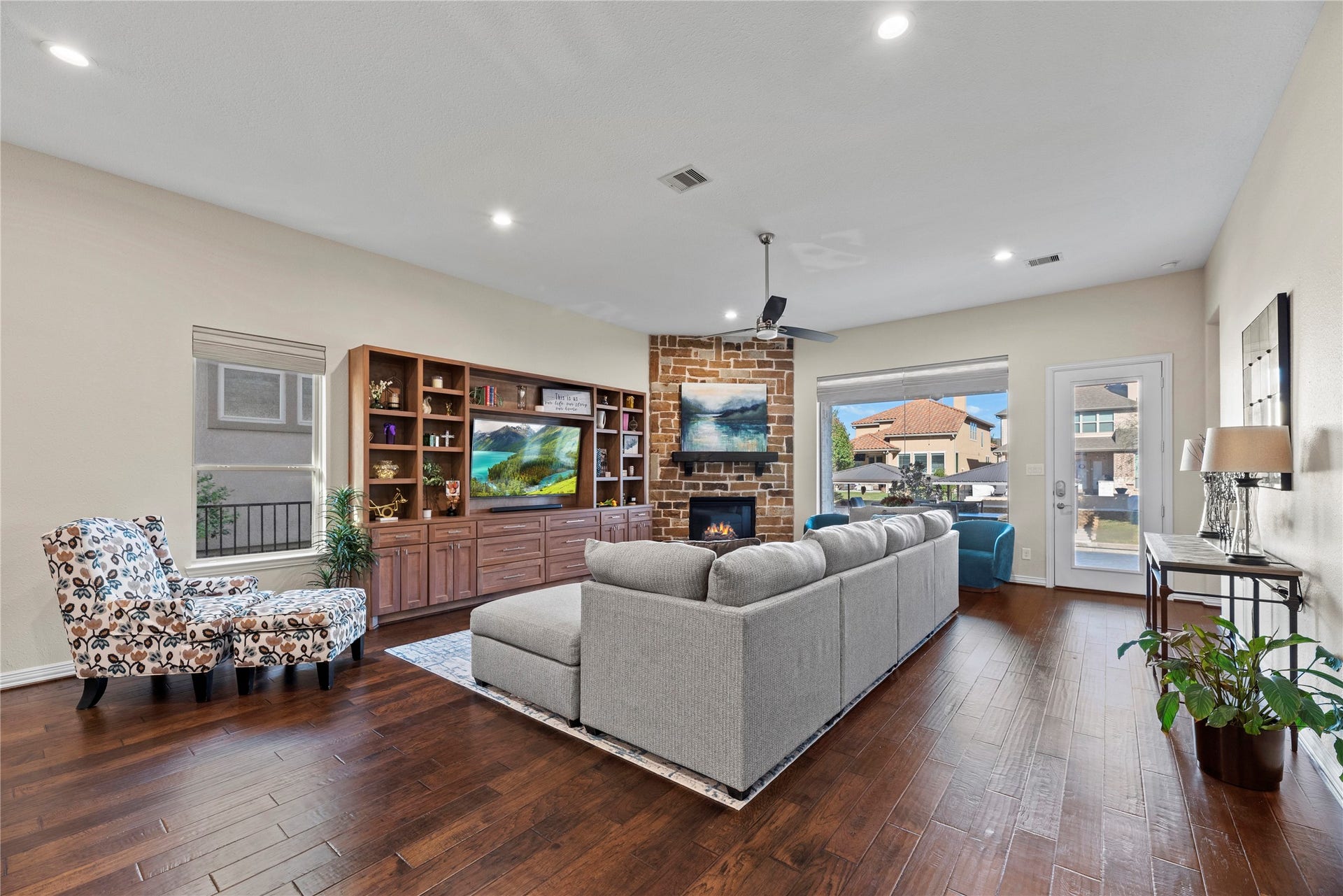 17922 Olde Oaks Estate Court, Cypress, TX 77433 The massive windows allow lots of natural light to enter the home.