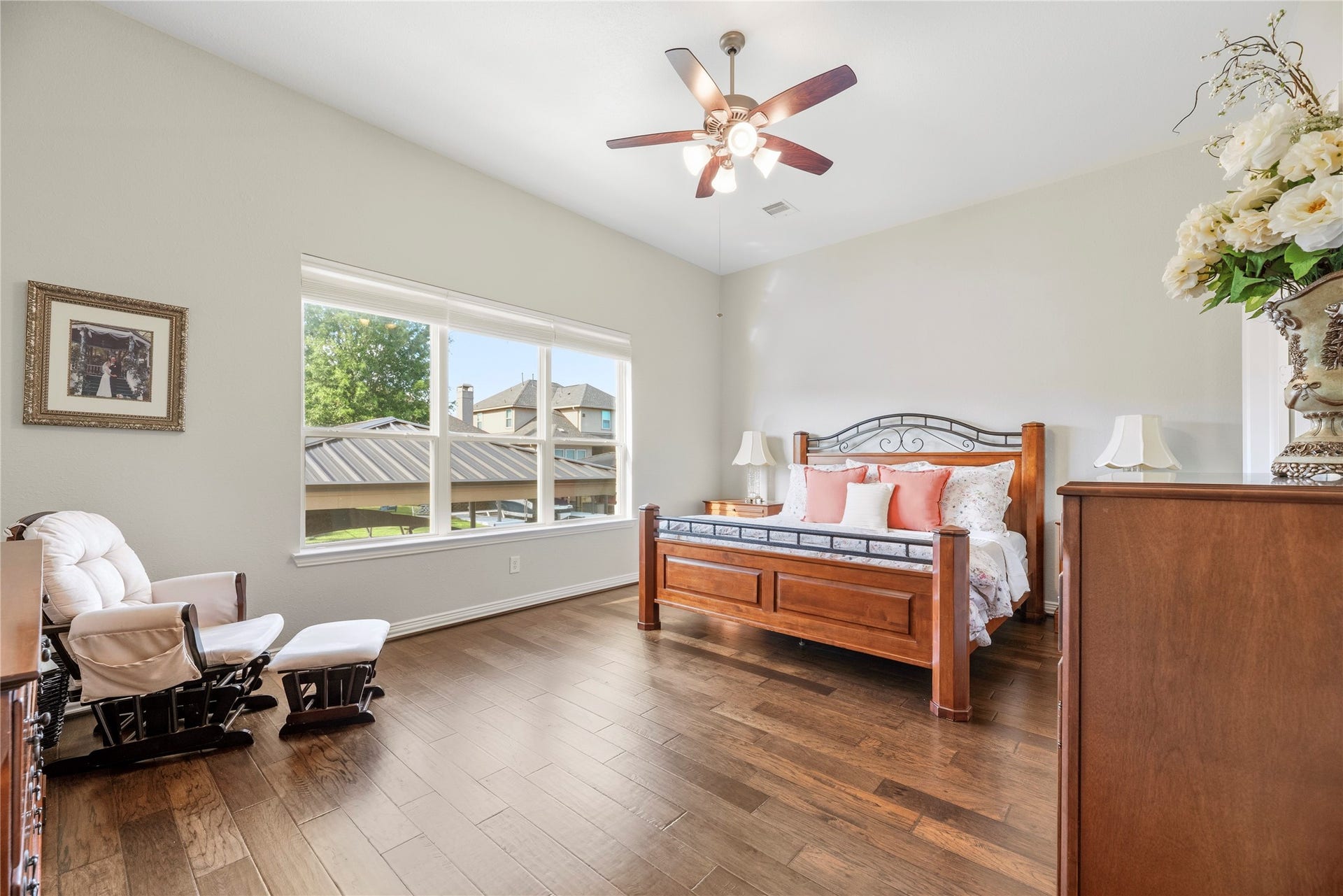 17922 Olde Oaks Estate Court, Cypress, TX 77433 The spacious primary bedroom has views of the canal.