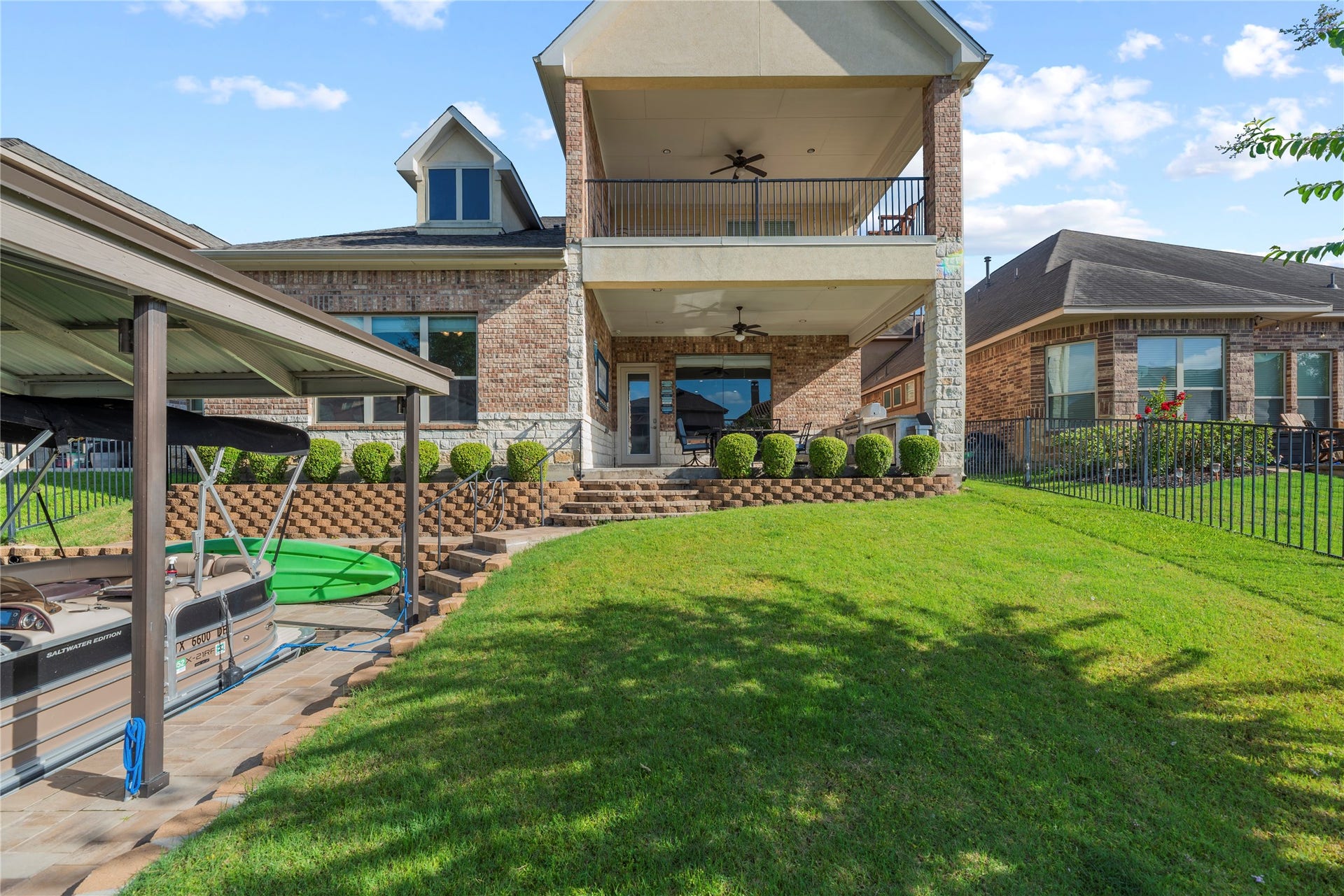 17922 Olde Oaks Estate Court, Cypress, TX 77433 Move from the balcony to the boat slip with ease with the paved staircase.