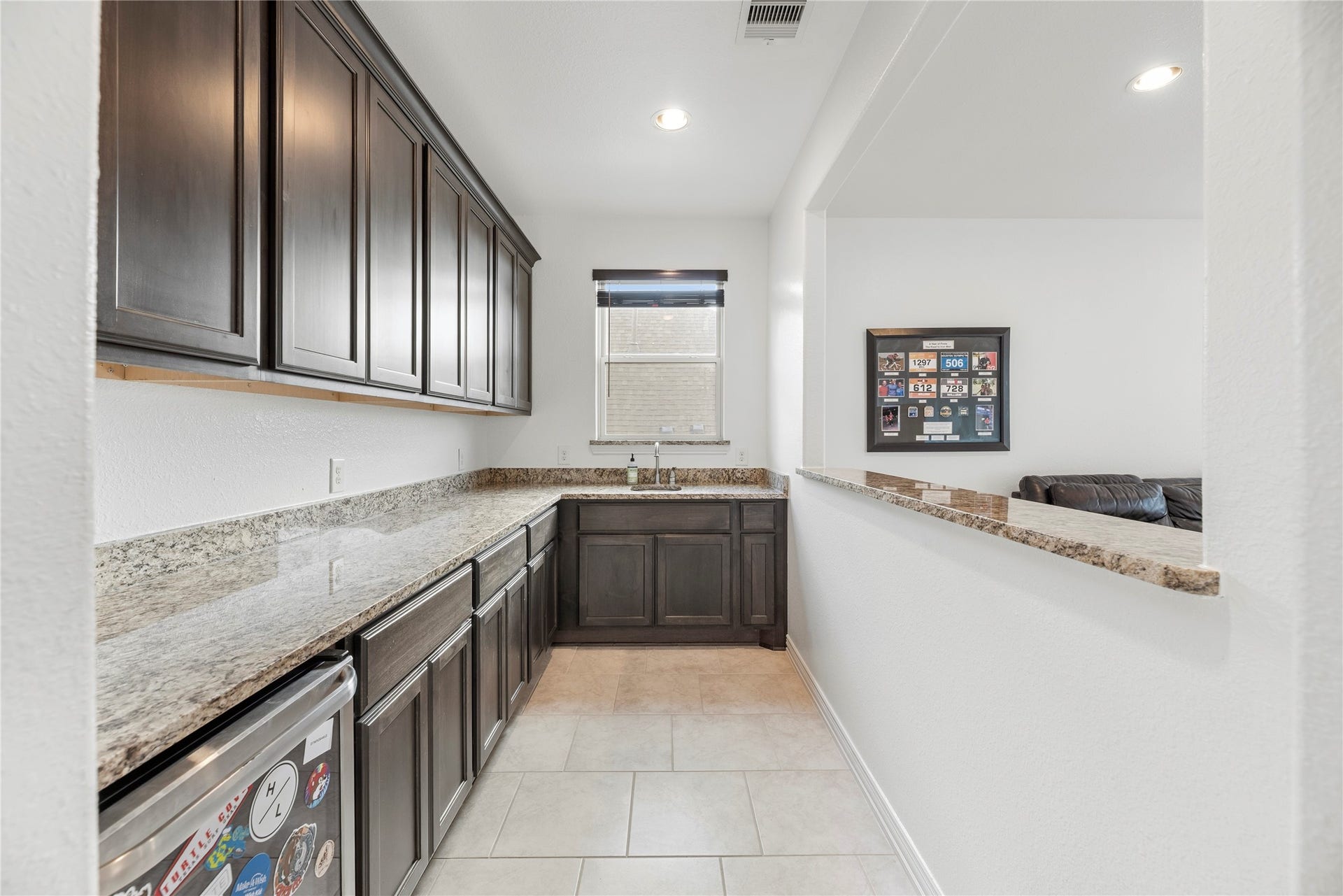 17922 Olde Oaks Estate Court, Cypress, TX 77433 Connected to the large game room is this functional kitchenette with plenty of storage.