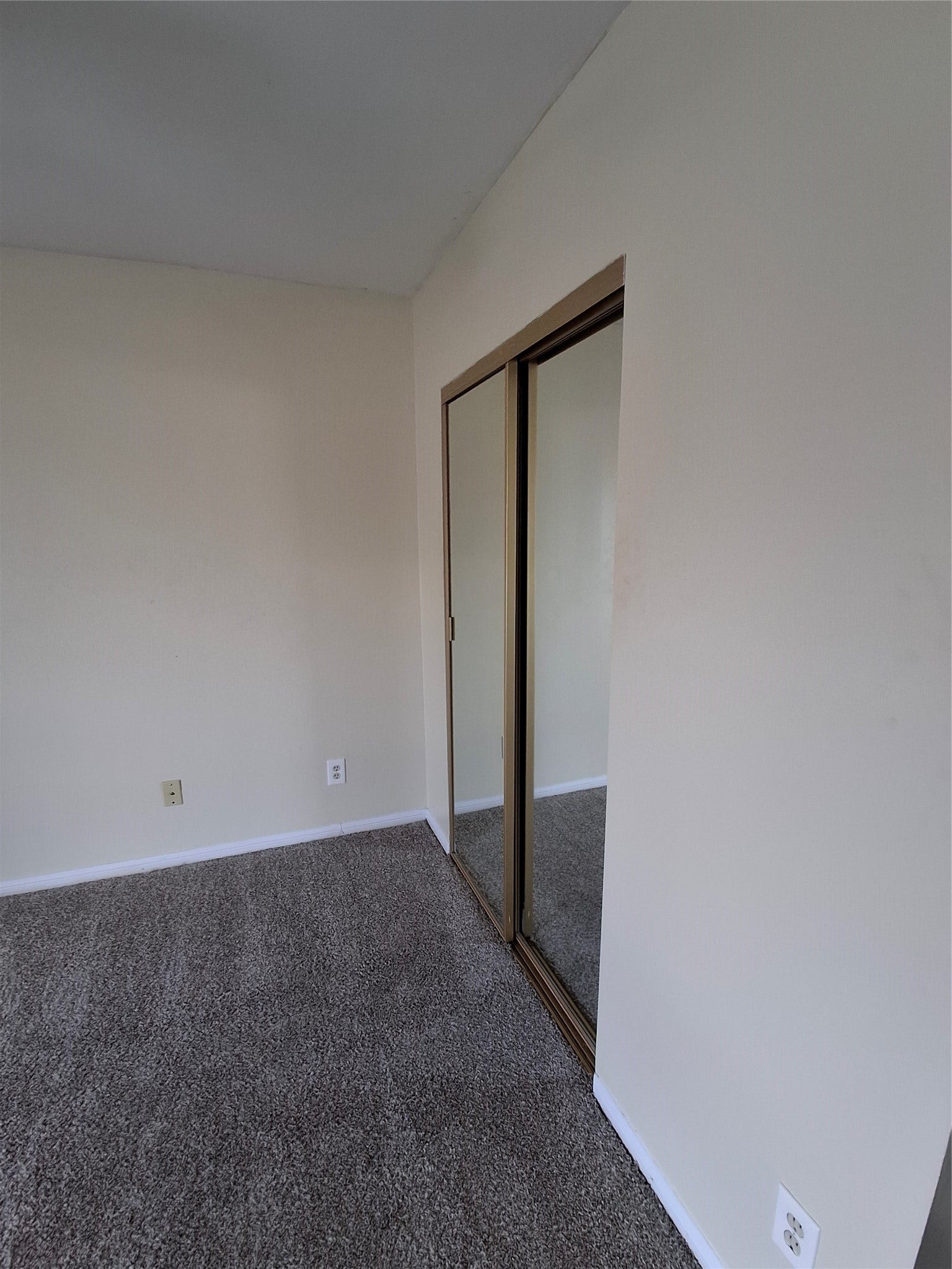 2917 Nottingham Lane, Missouri City, TX 77459 Part of Bedroom #2 looking at the door of the closet.