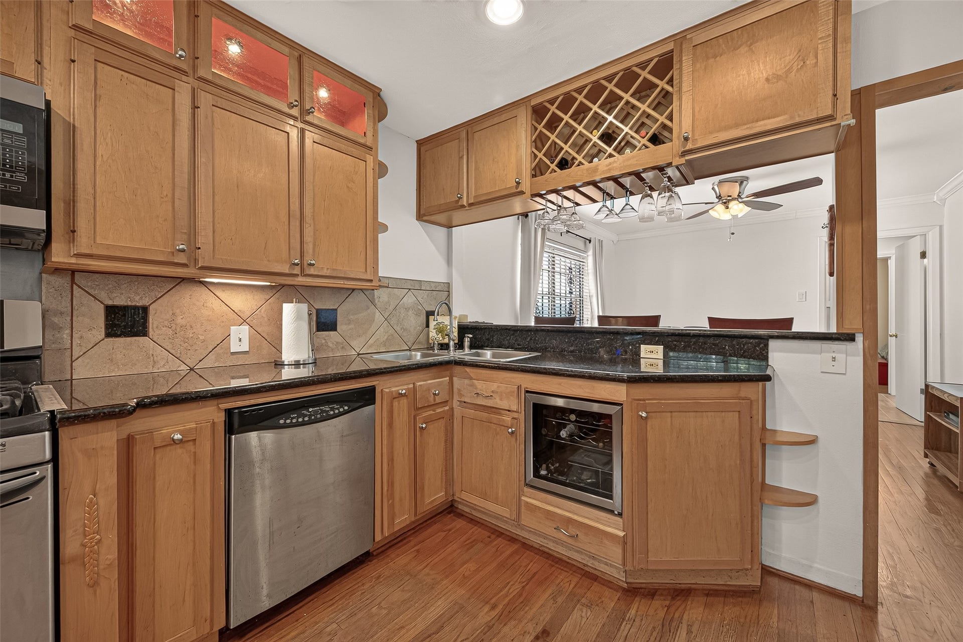 6655 Wildwood Way, Houston, TX 77023 Chiller for wine or sparking waters.Wine rack over the breakfast bar. No wasted space, cabinets galore.