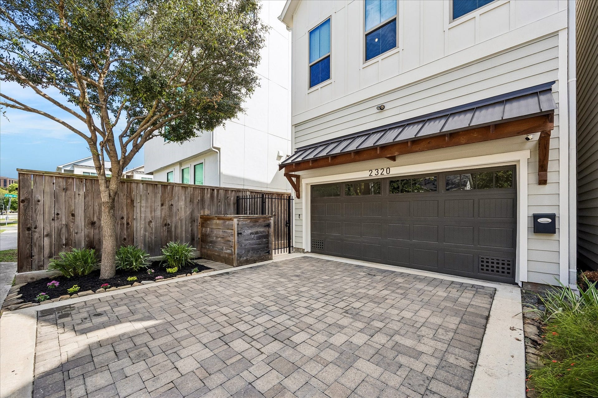 2320 Couch Street, Houston, TX 77008 Heights living looks good here. This stylish 3-bedroom, 2.5-bath home offers an open layout, engineered wood & designer tile flooring, a roomy game room & luxurious primary retreat. Spacious bedrooms w/walk-in closets add great storage, while the 2-car garage has custom built-ins & epoxy flooring. Outside, enjoy low-maintenance turf, added automatic lighting & security cameras, plus a natural gas connection for portable generator backup.