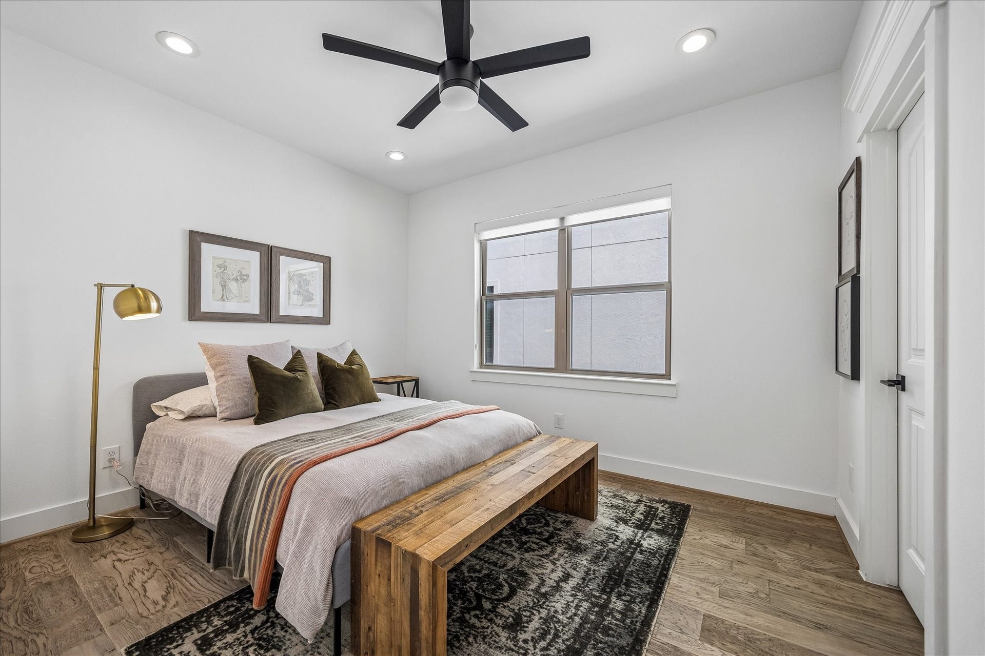 2320 Couch Street, Houston, TX 77008 This upstairs guest bedroom is roomy, bright and ready to make visitors feel right at home. A large walk-in closet adds great storage, and the full bathroom is conveniently located just outside the door.