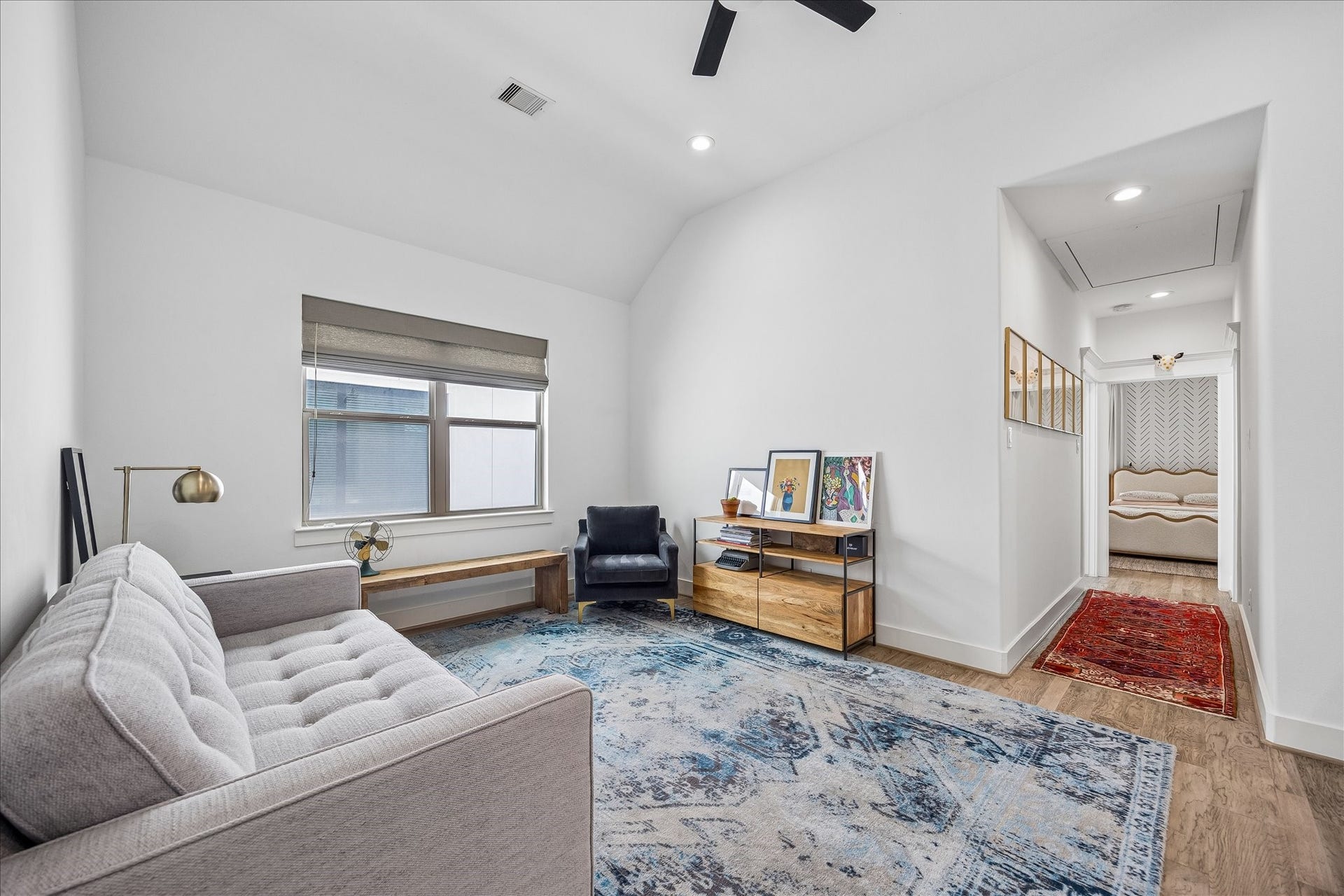 2320 Couch Street, Houston, TX 77008 The upstairs game room gives everyone a little extra breathing room. Vaulted ceilings, wood flooring, recessed lighting and a modern ceiling fan create an easy spot for movie nights, game days or just hanging out.