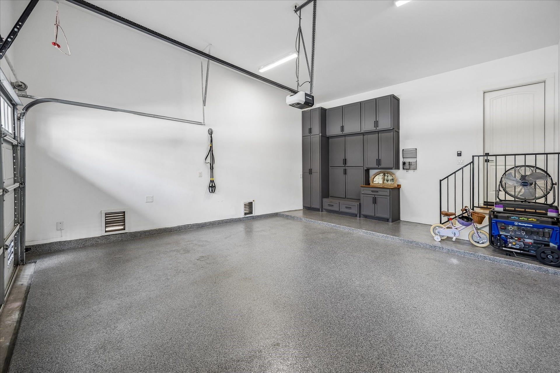 2320 Couch Street, Houston, TX 77008 Yes, even the garage feels upgraded. This 2-car attached garage offers remote openers, professionally finished epoxy flooring & a custom built-in storage system designed to maximize organization. The storage components can also be relocated or transferred if desired.