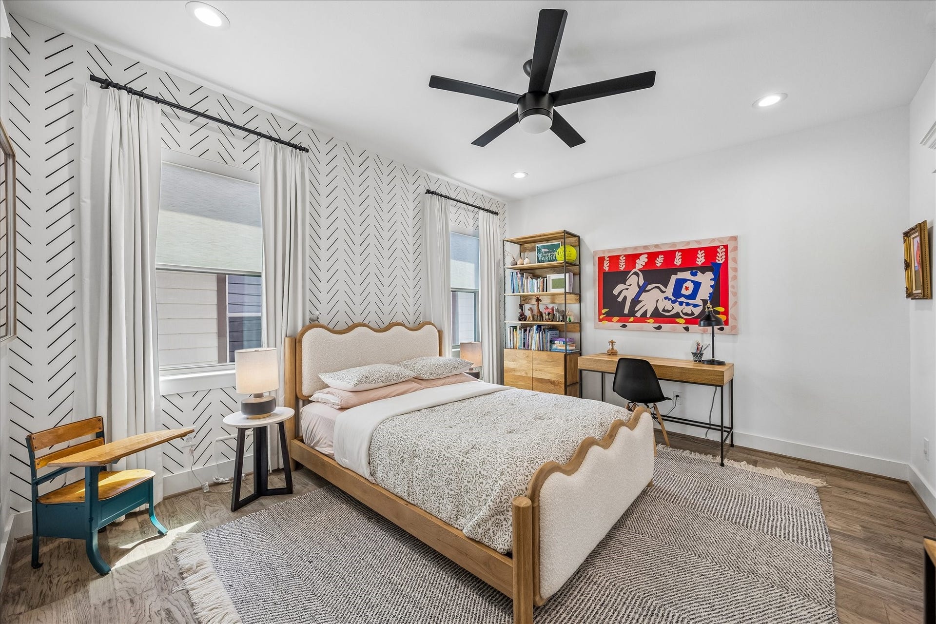 2320 Couch Street, Houston, TX 77008 Guests may not want to leave this one. The upstairs bedroom adds personality with custom wallpaper, plus a walk-in closet, ensuite access to the full bathroom and plenty of room to settle in comfortably.