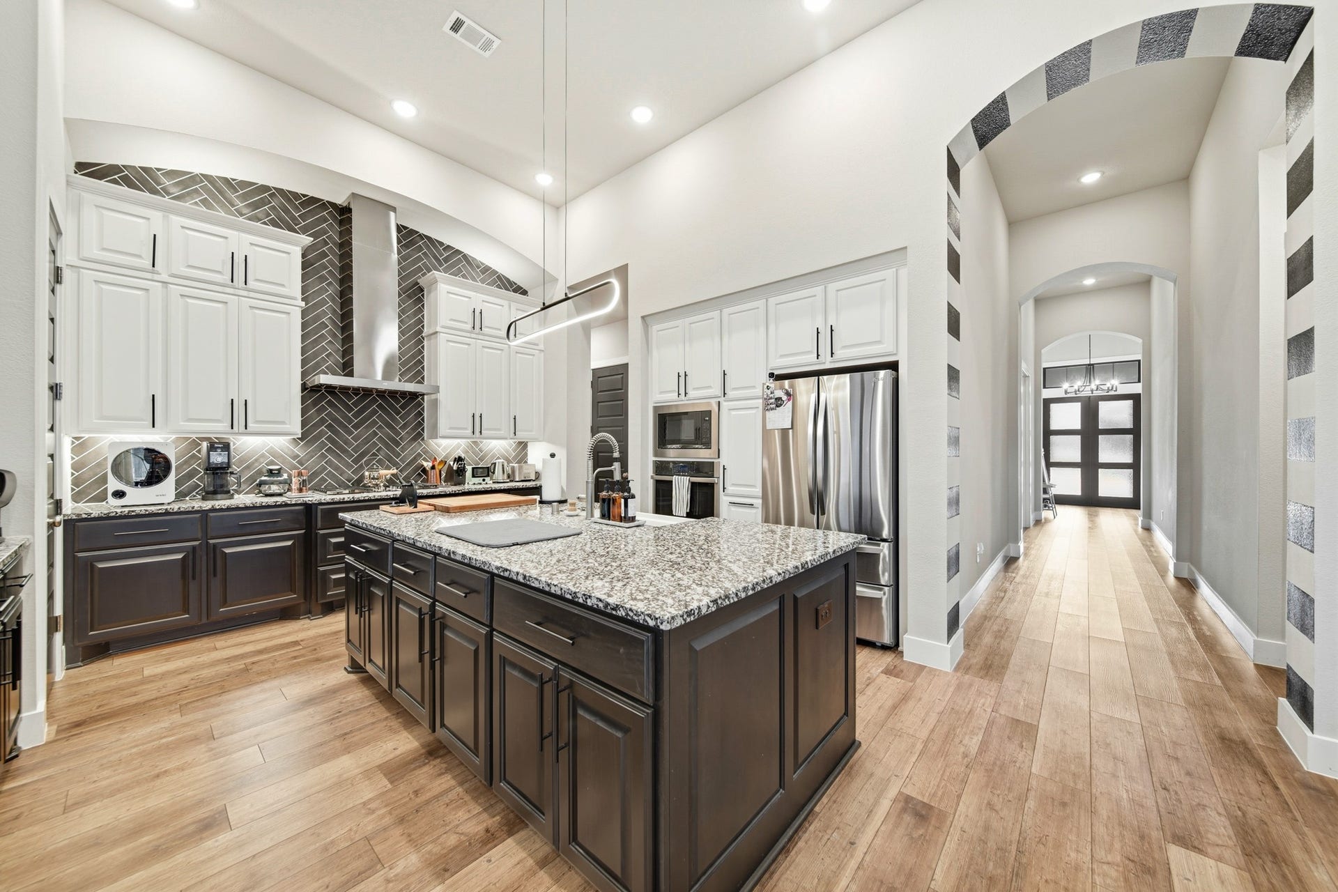 Granite countertop island with plenty of storage.