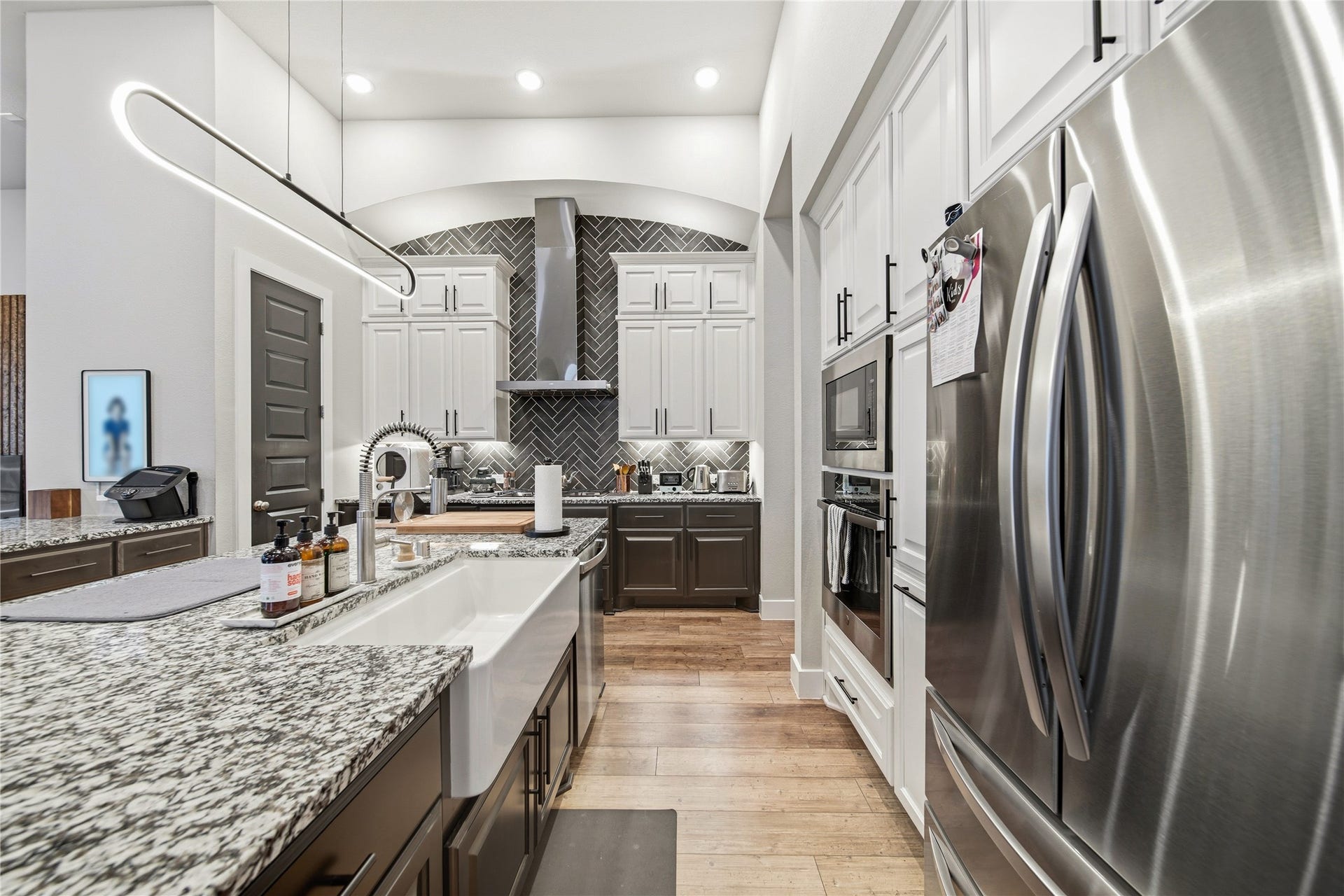 Island includes a Farmhouse sink.