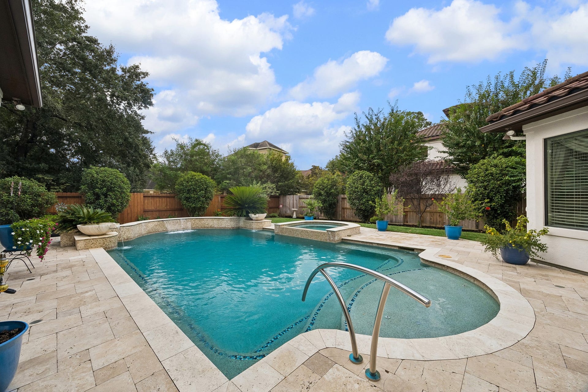 8111 Marshall Falls Drive, Spring, TX 77379 Beautiful pool in a tranquil setting!