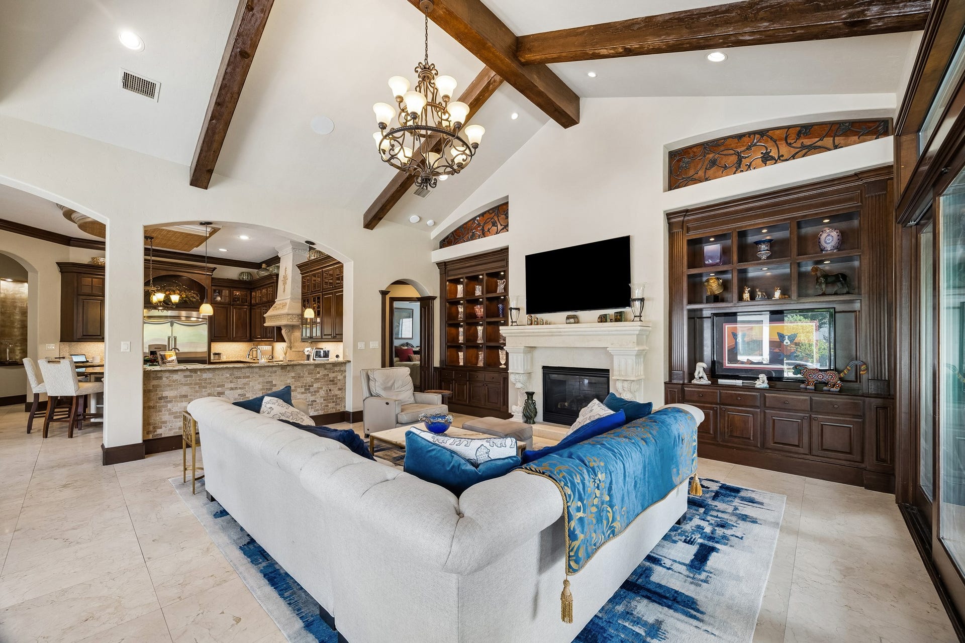 8111 Marshall Falls Drive, Spring, TX 77379 Another view of the family room looking back toward the kitchen. The vaulted ceiling and natural light are amazing!