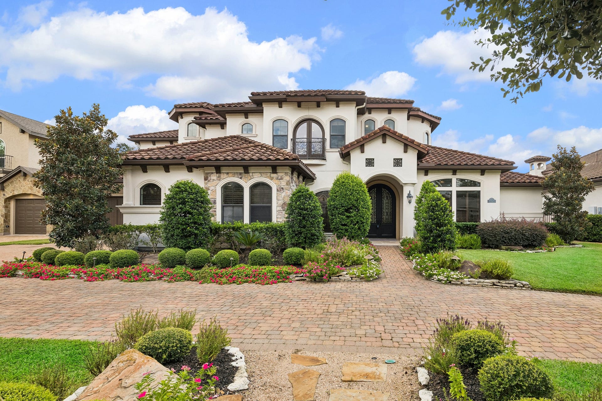 8111 Marshall Falls Drive, Spring, TX 77379 Step into this exquisite resort-style home in an exclusive sought-after gated community.