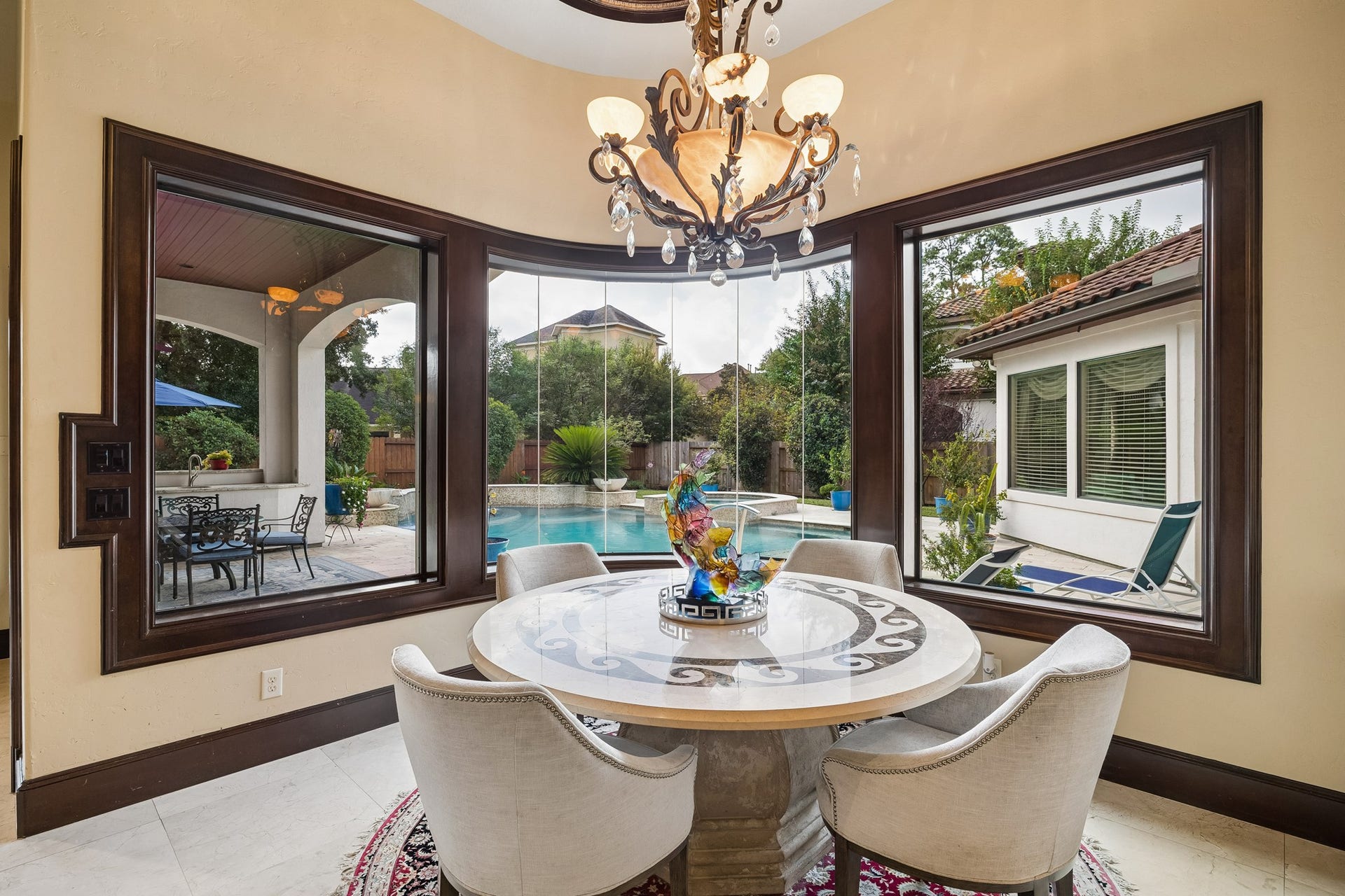 8111 Marshall Falls Drive, Spring, TX 77379 The breakfast room is perfectly situated and offers stunning views of the pool and landscaped backyard through large bay windows.