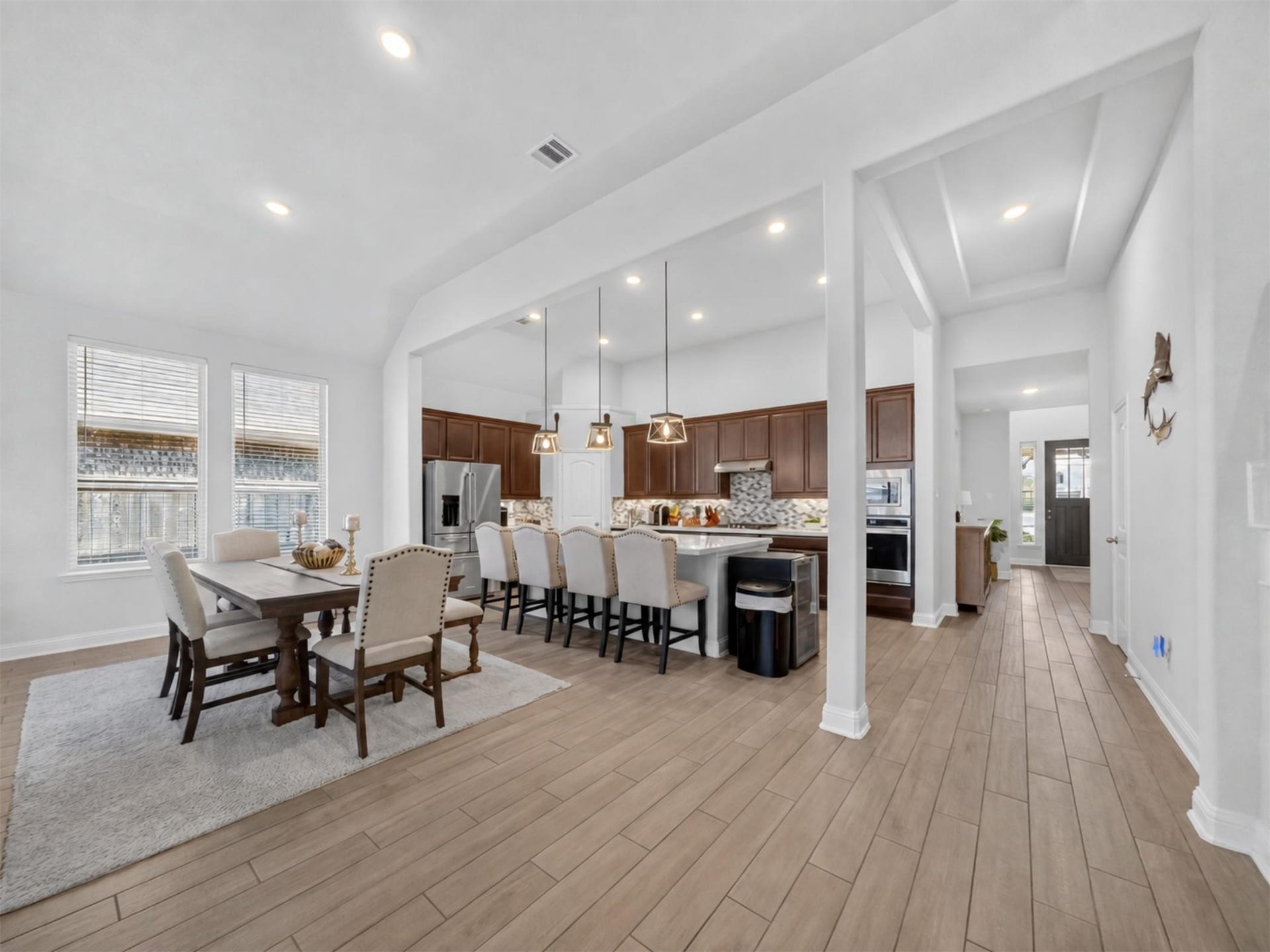 15419 Wilsons Snipe Court, Cypress, TX 77433 Whether it is a quiet night at home or a house full of guests, this open layout gives the kitchen, dining and living spaces plenty of room to work together.