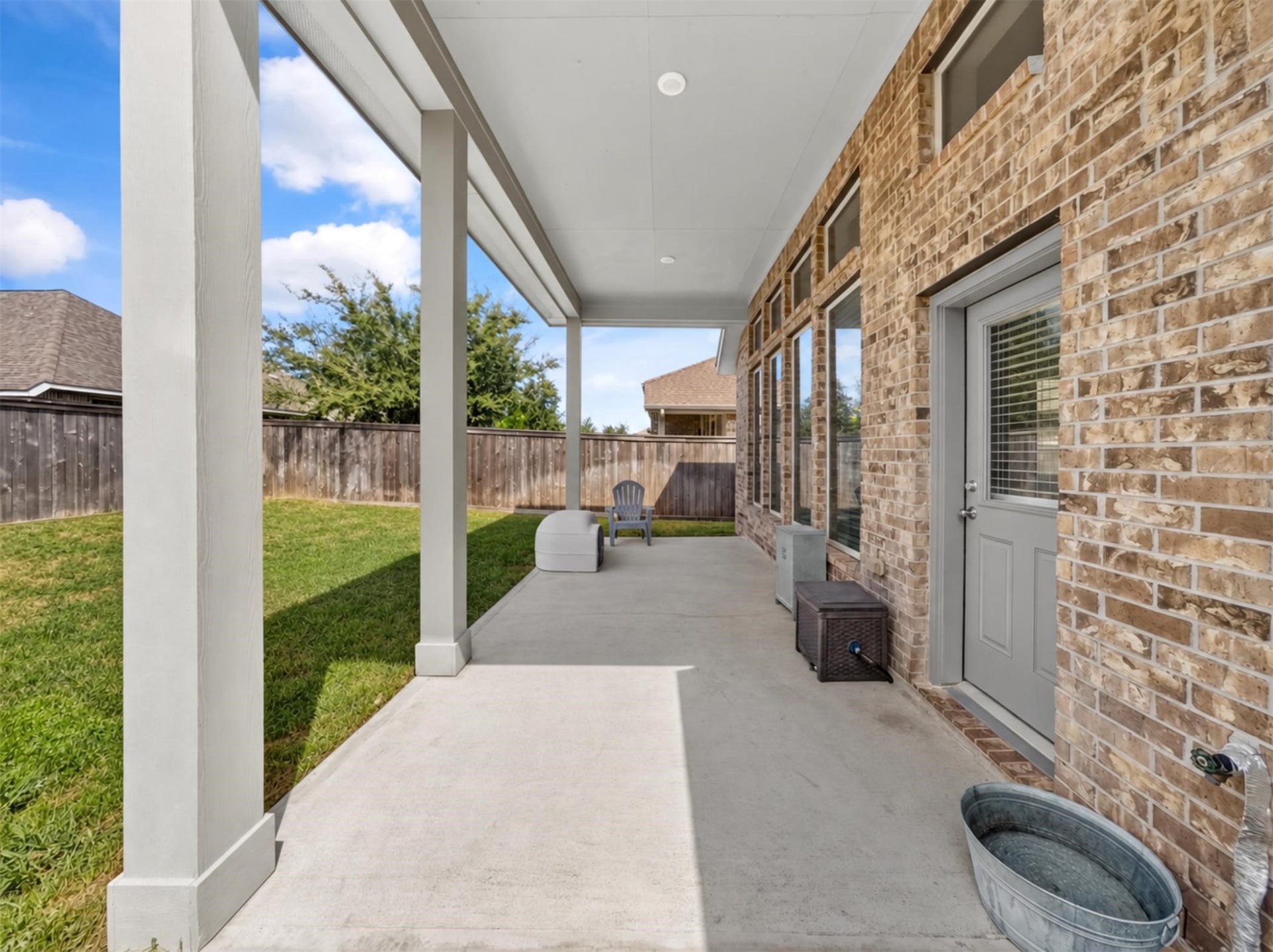15419 Wilsons Snipe Court, Cypress, TX 77433 The large covered patio extends the living space outside, with plenty of room for outdoor seating, dining and grilling in the shade.