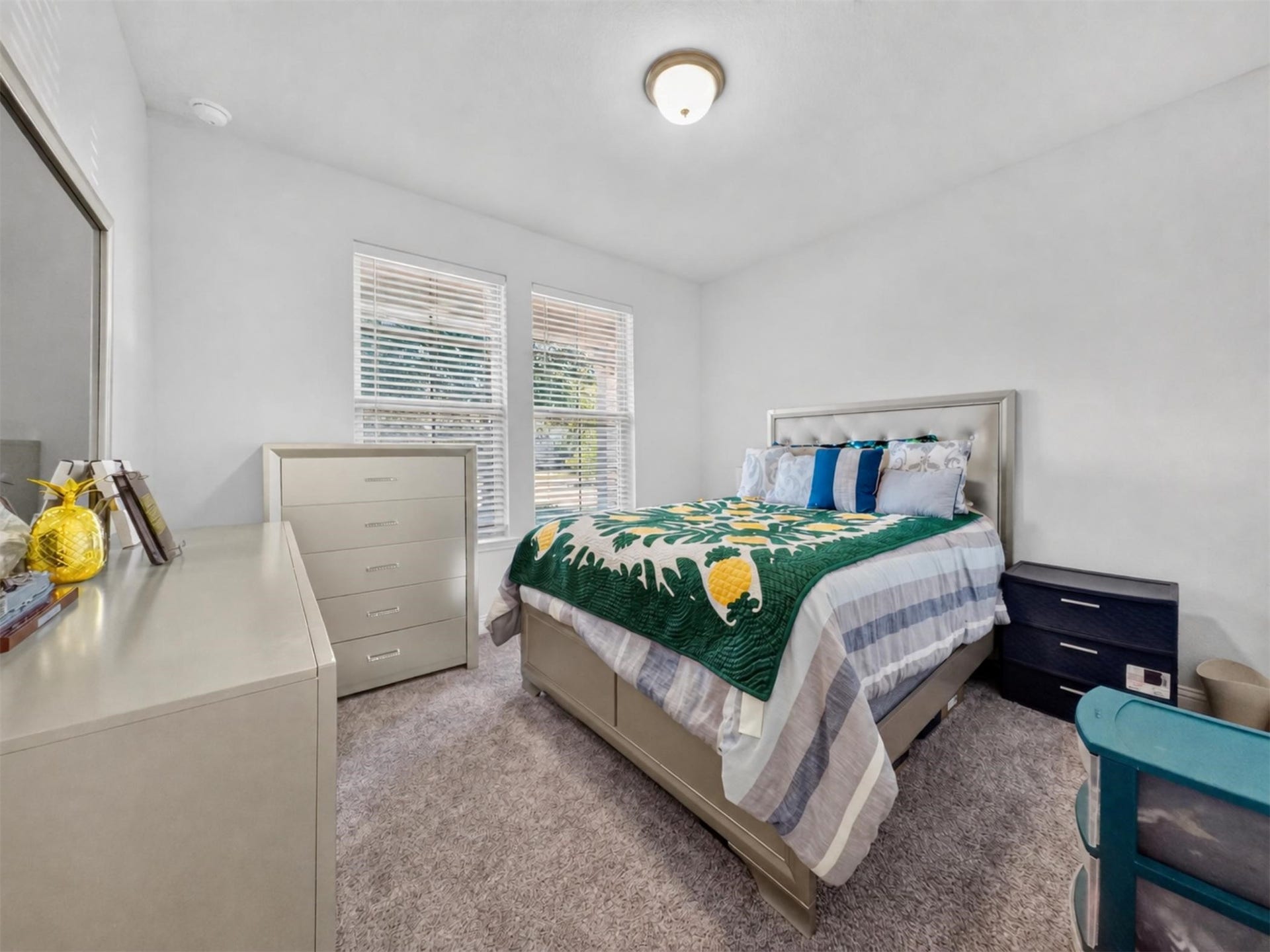 15419 Wilsons Snipe Court, Cypress, TX 77433 This first-floor secondary bedroom looks out toward the front yard and sits close to a full bathroom, creating a comfortable setup for guests or household members.