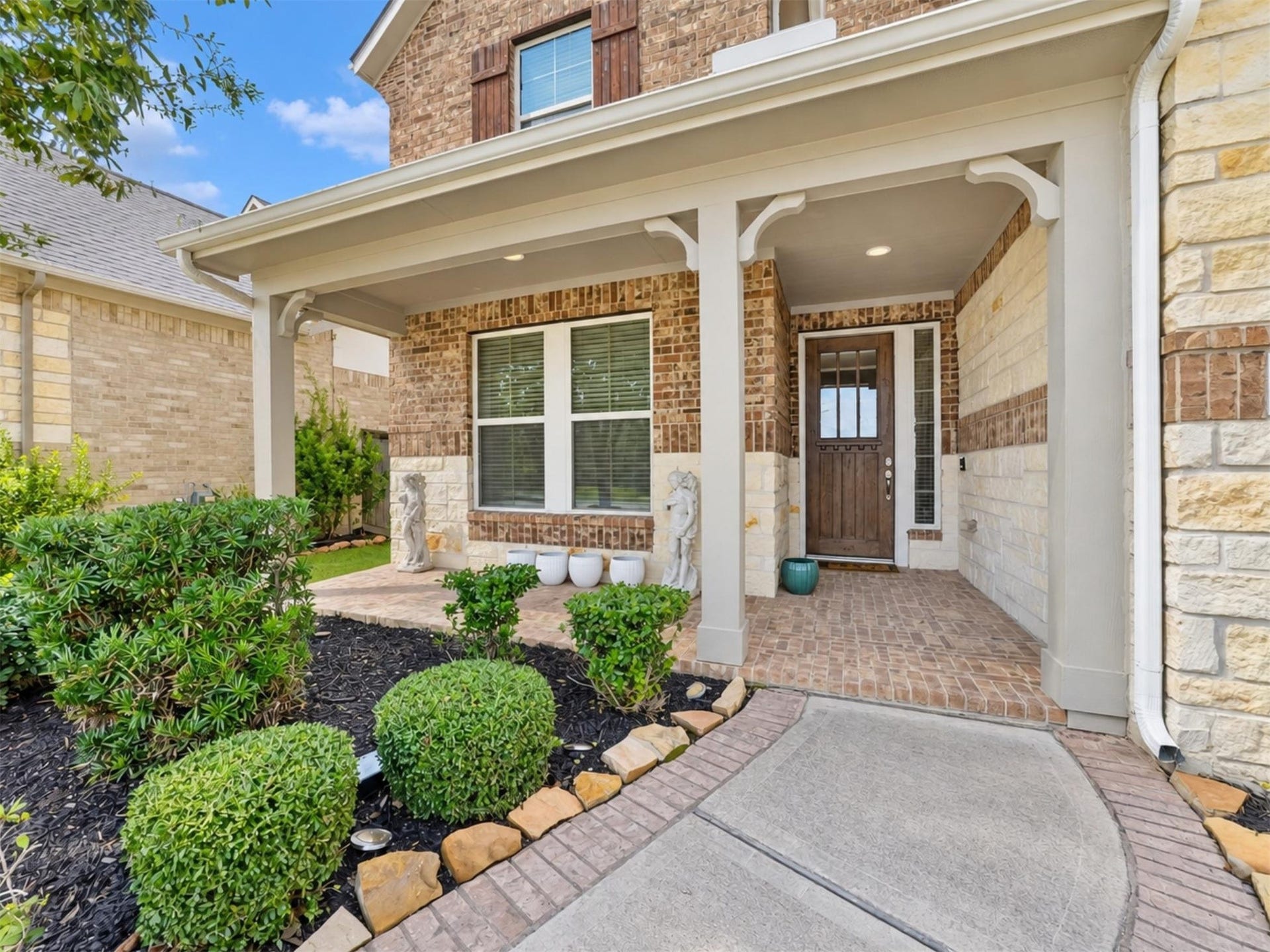 15419 Wilsons Snipe Court, Cypress, TX 77433 A handsome brick and stone exterior sets the stage for a home with one of its biggest advantages inside: most bedrooms and everyday living spaces are all on the first floor.