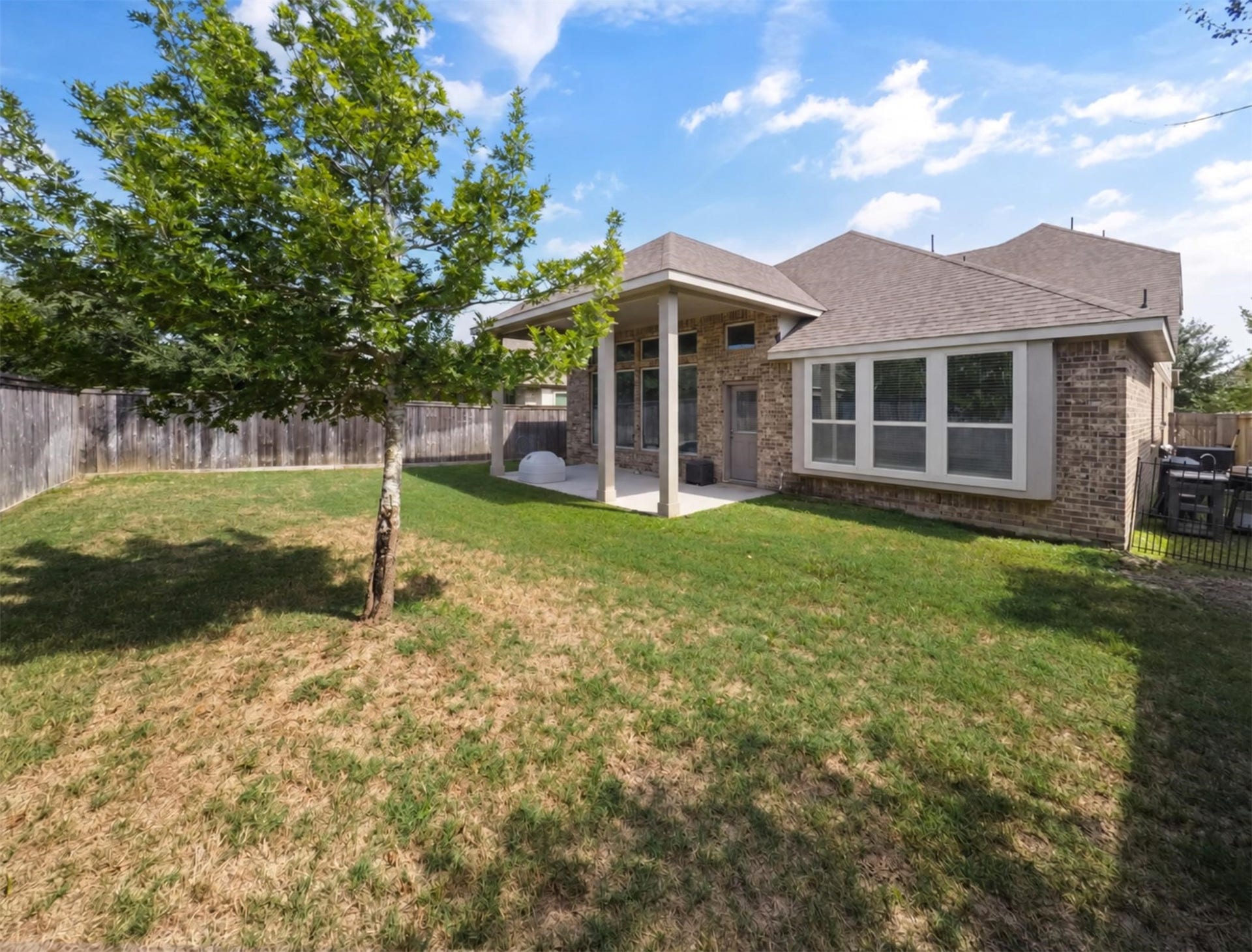 15419 Wilsons Snipe Court, Cypress, TX 77433 There is room to make this backyard your own, whether that means a play area, garden, space for pets or simply enjoying the covered patio.