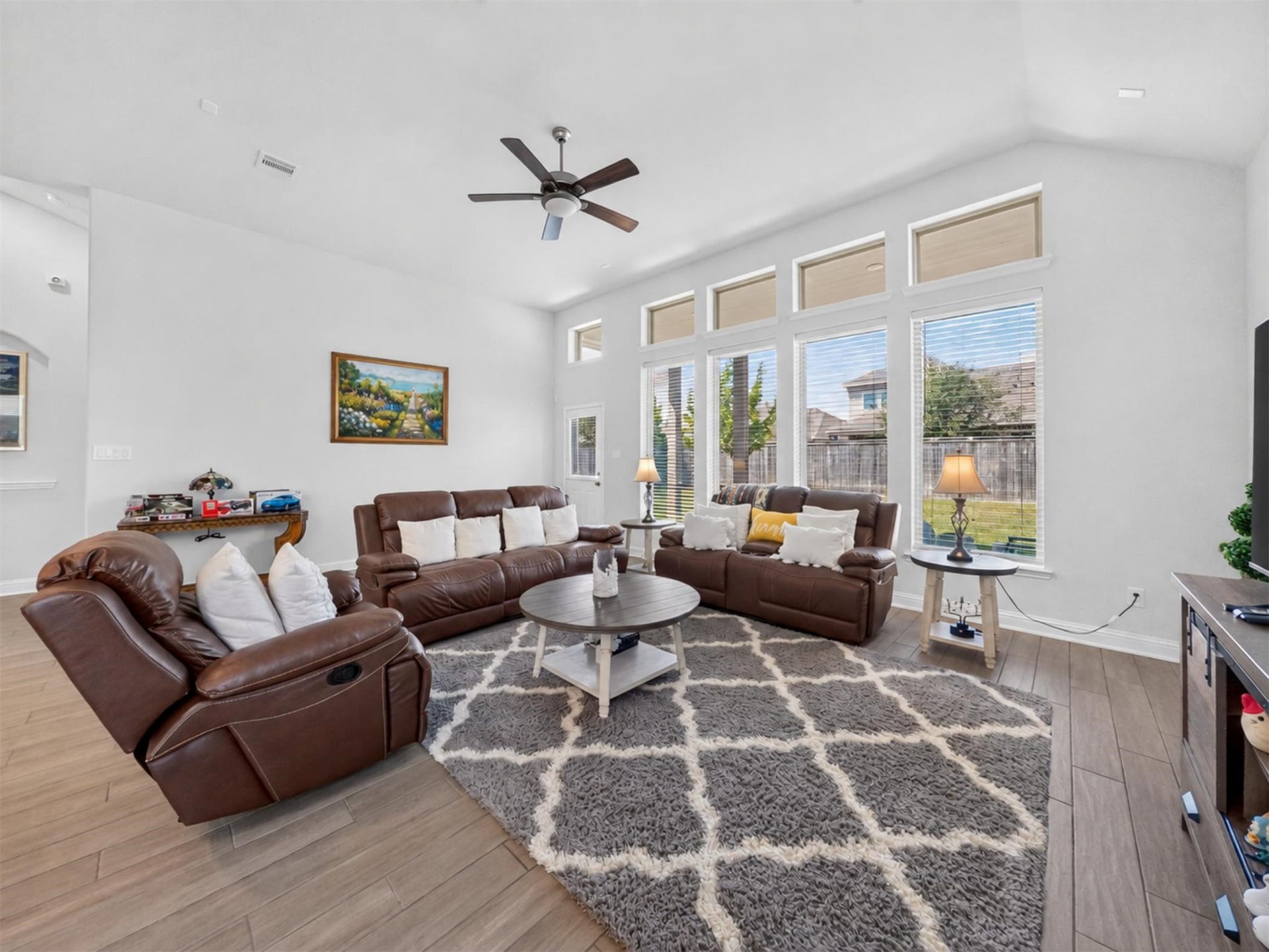 15419 Wilsons Snipe Court, Cypress, TX 77433 There is no need to downsize the furniture here. The large living room has plenty of space for oversized seating while staying open to the kitchen and dining area.