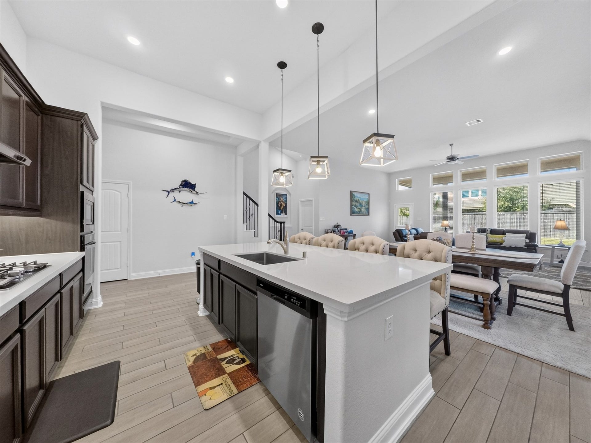 15419 Wilsons Snipe Court, Cypress, TX 77433 A kitchen built for people who actually cook, with gas cooking, a vent to the exterior, quartz countertops, lots of workspace, stainless appliances and plenty of storage.