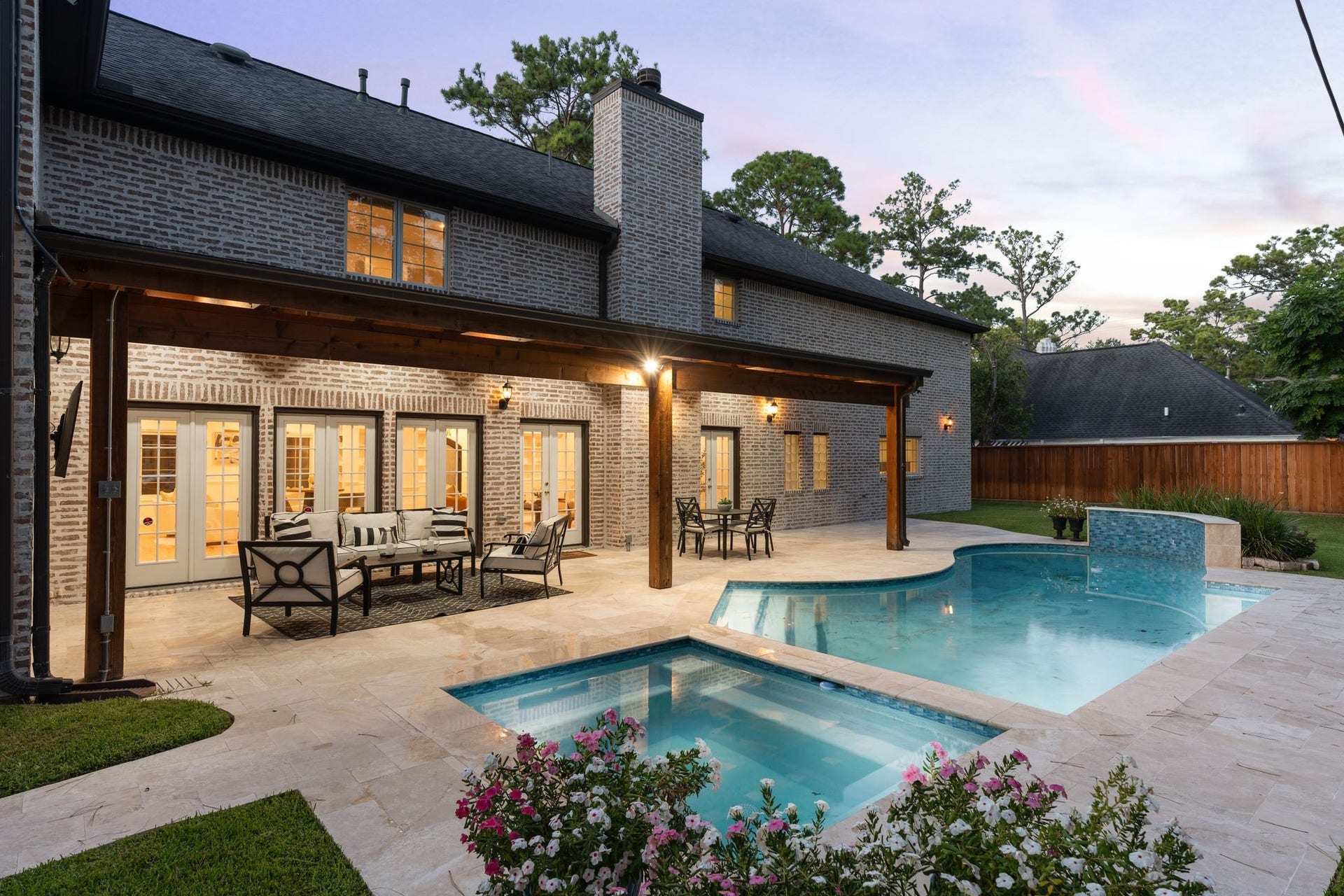 11407 Holidan Way, Hedwig Village, TX 77024 A sneak peek into your incredible resort style backyard. Features a sparkling pool, a new expansive covered patio & large green space. An incredible setting for evening gatherings, poolside dinners & year-round outdoor enjoyment with family and friend.