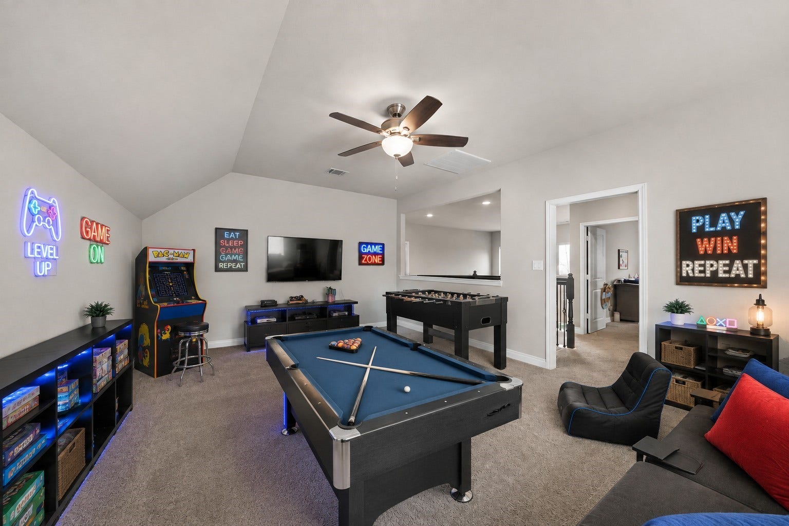 6902 N Elmwood Trail, Katy, TX 77493 An ultimate game room with plenty of space for a pool table, comfortable seating and endless entertainment.