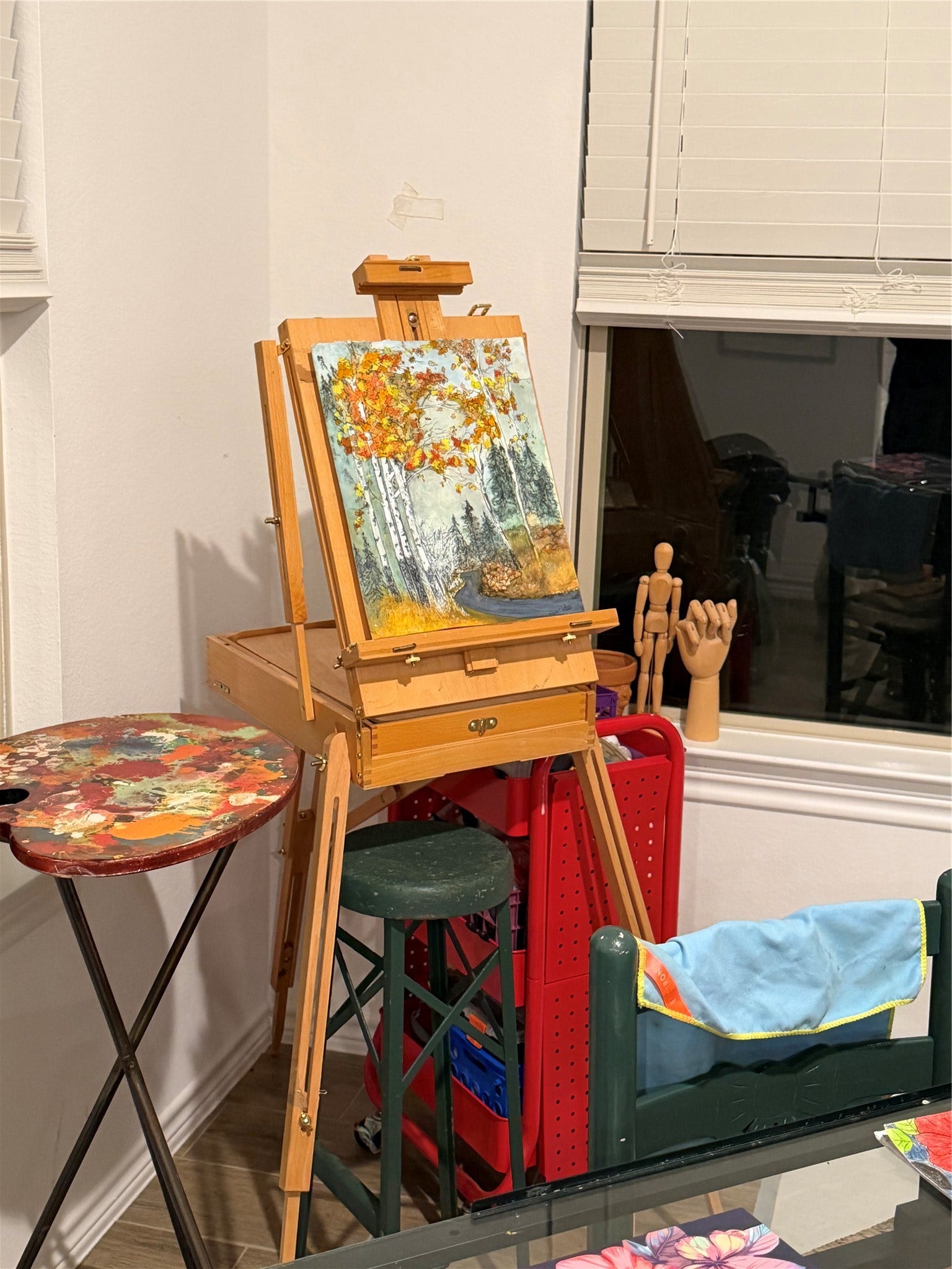 8015 Prospect Drive, Fulshear, TX 77441 A charming corner of the study offers an inspiring space for painting and creative pursuits. Natural light from the window makes it an ideal spot to enjoy your favorite hobbies.