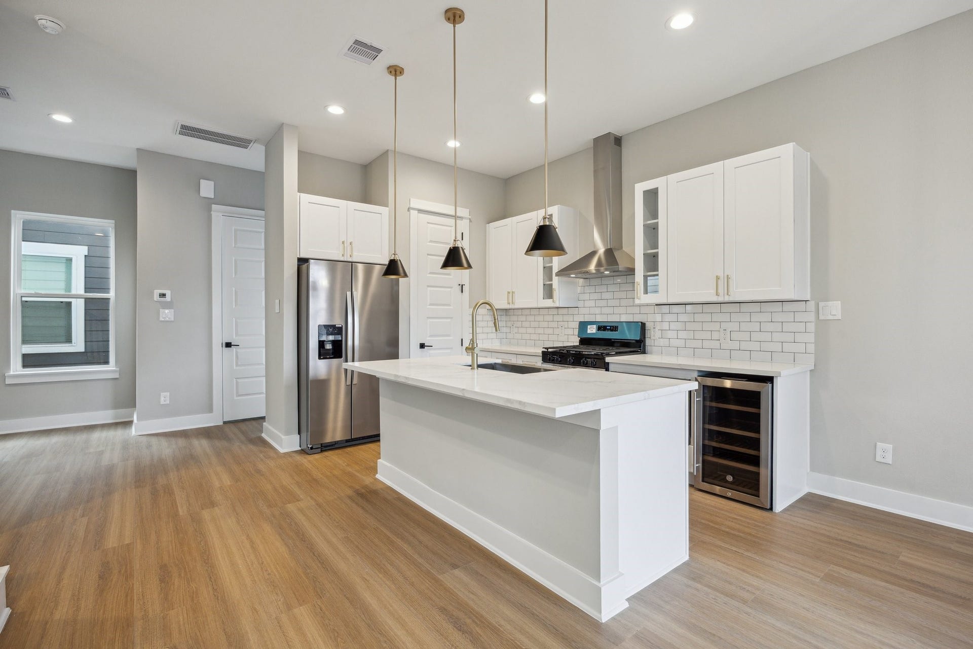812 Thornton Street, #F, Houston, TX 77018 Spacious kitchen with island *picture is of a previously constructed home by the builder. 812 Thornton finishes will be very similar but this photo is meant to show craftsmanship, quality and to show a product very similar to the plan for 812 Thornton. However, the builder has the right to change finishes at their sole discretion.