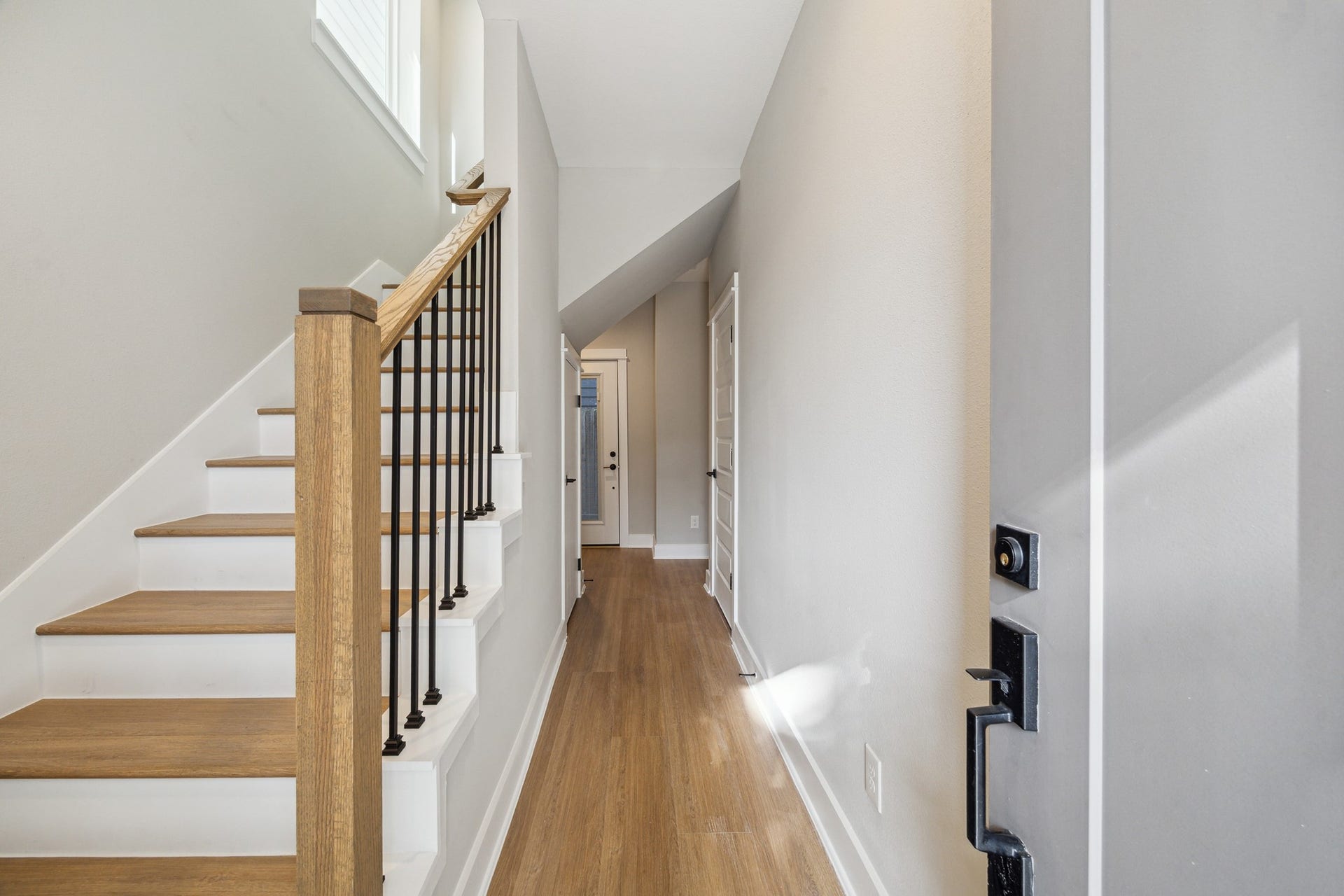 812 Thornton Street, #F, Houston, TX 77018 Entry hallway with large storage closet under stairs *picture is of a previously constructed home by the builder. 812 Thornton finishes will be very similar but this photo is meant to show craftsmanship, quality and to show a product very similar to the plan for 812 Thornton. However, the builder has the right to change finishes at their sole discretion.