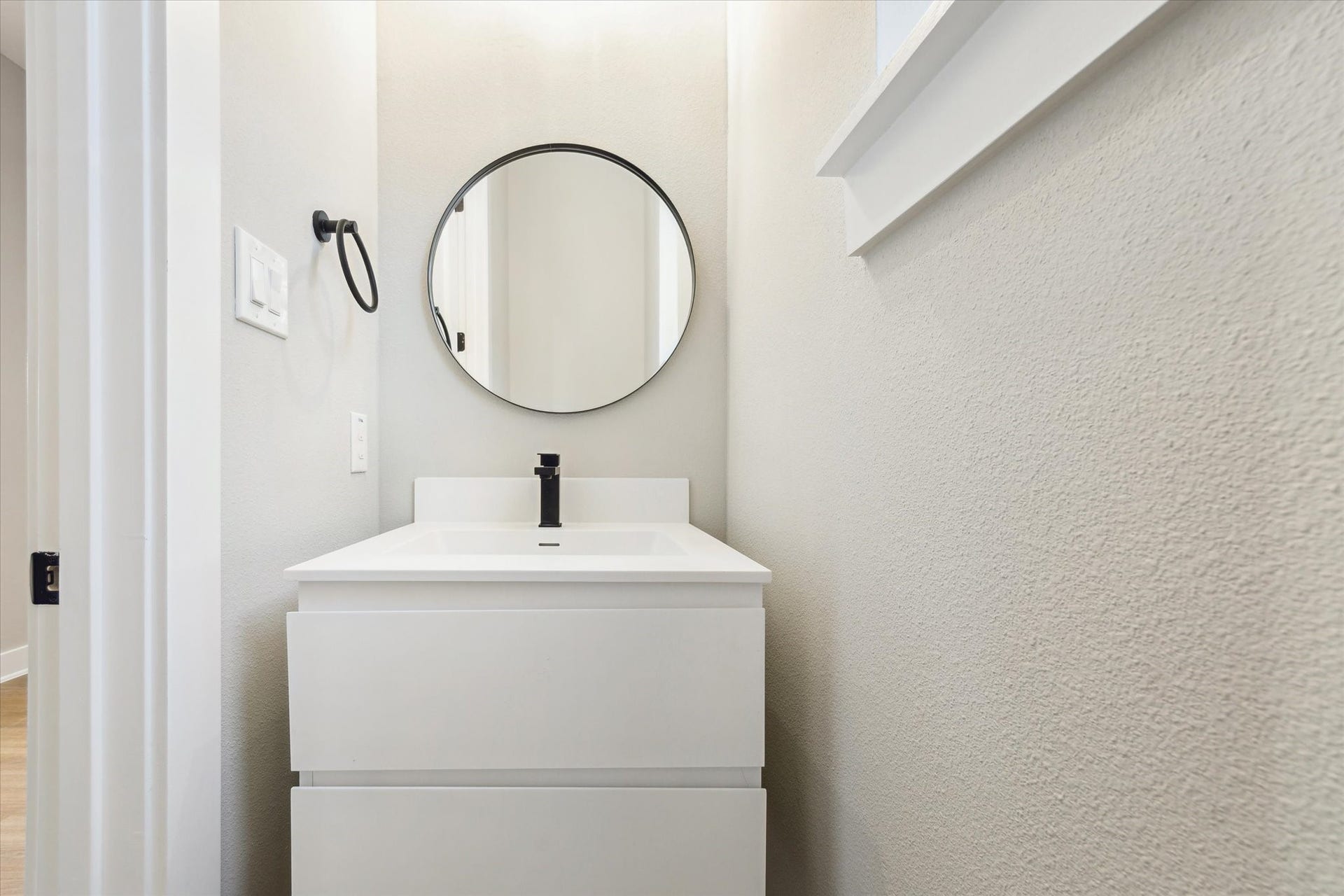 812 Thornton Street, #F, Houston, TX 77018 Powder bath adjacent to kitchen *picture is of a previously constructed home by the builder. 812 Thornton finishes will be very similar but this photo is meant to show craftsmanship, quality and to show a product very similar to the plan for 812 Thornton. However, the builder has the right to change finishes at their sole discretion.