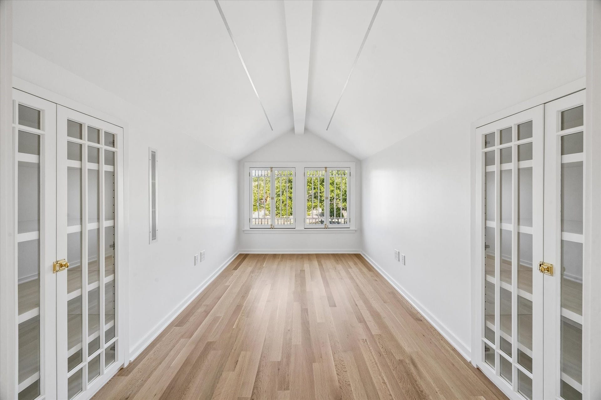 1203 Heights Boulevard, Houston, TX 77008 Office/Study faces Heights Blvd. built in bookcases with custom doors and original restored window.