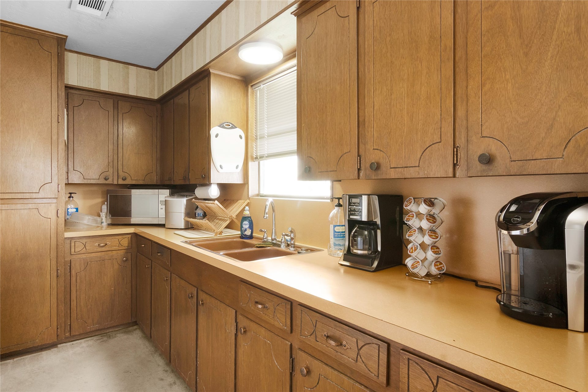 856 Bonita Street, Bayou Vista, TX 77563 Another view of kitchen which has double sinks, a pantry and an incredible view from the kitchen window.