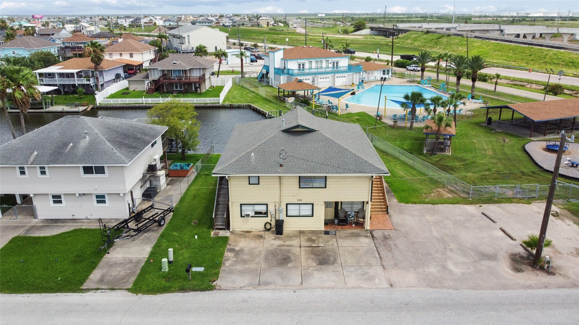 856 Bonita Street, Bayou Vista, TX 77563 Ariel view of the home with the city pool and community center. Garden Club meets second Tuesday of each month. Aerobic Swimming for adults in the summer each weekday morning.