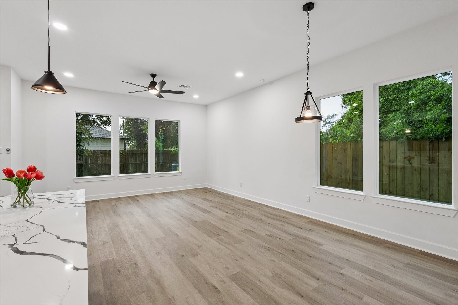 8715 Shotwell Street, #B, Houston, TX 77016 Another view of the spacious family room, filled with abundant natural light throughout the day.