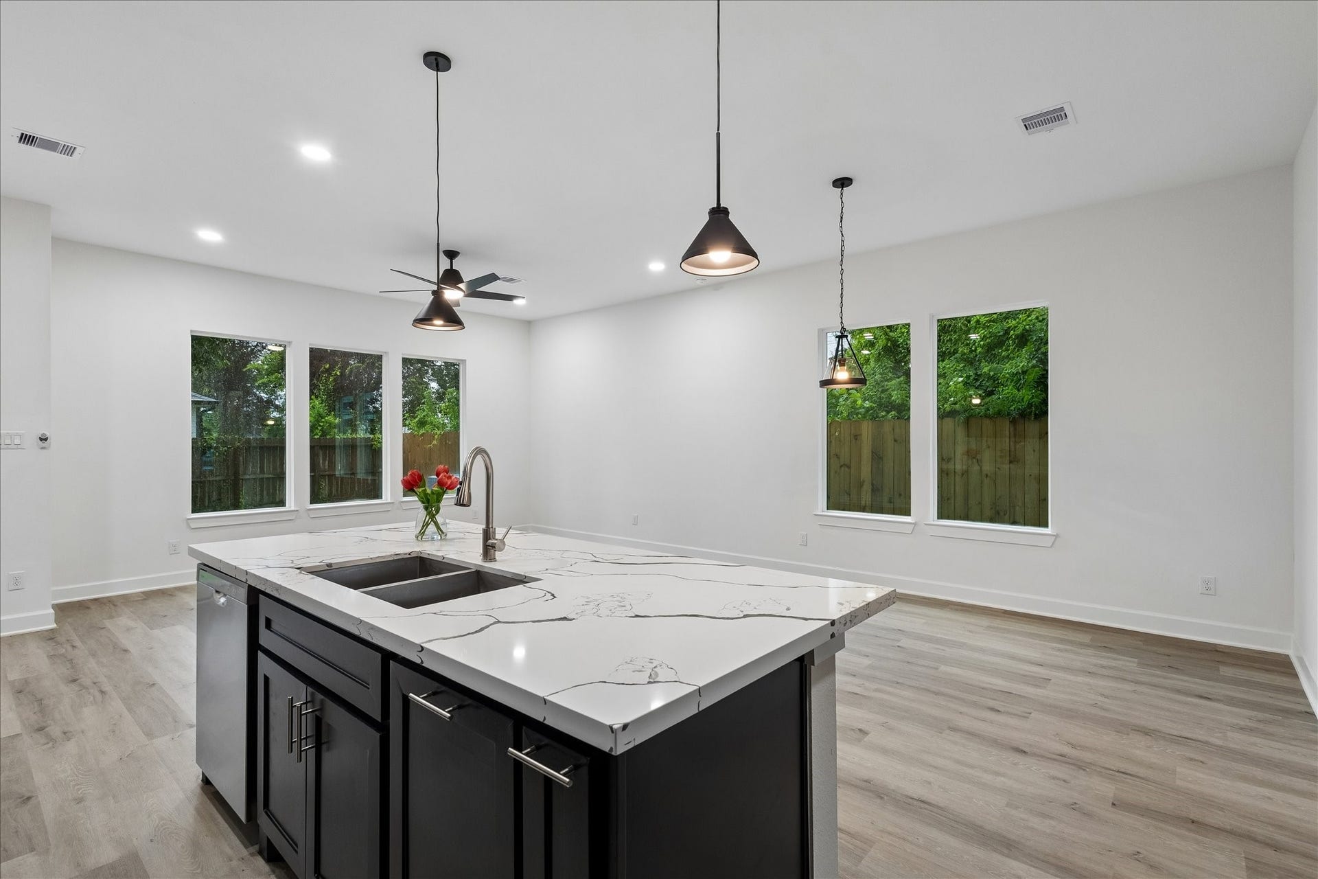 8715 Shotwell Street, #B, Houston, TX 77016 The open-concept layout flows seamlessly into a spacious family room.