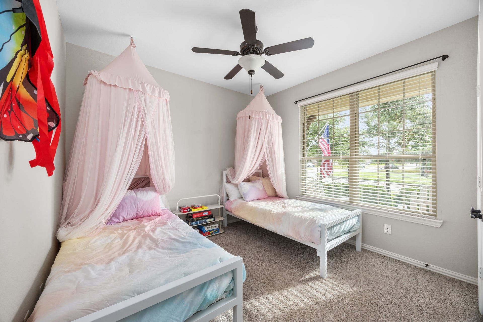 Downstairs bedroom that looks out onto the front lawn.